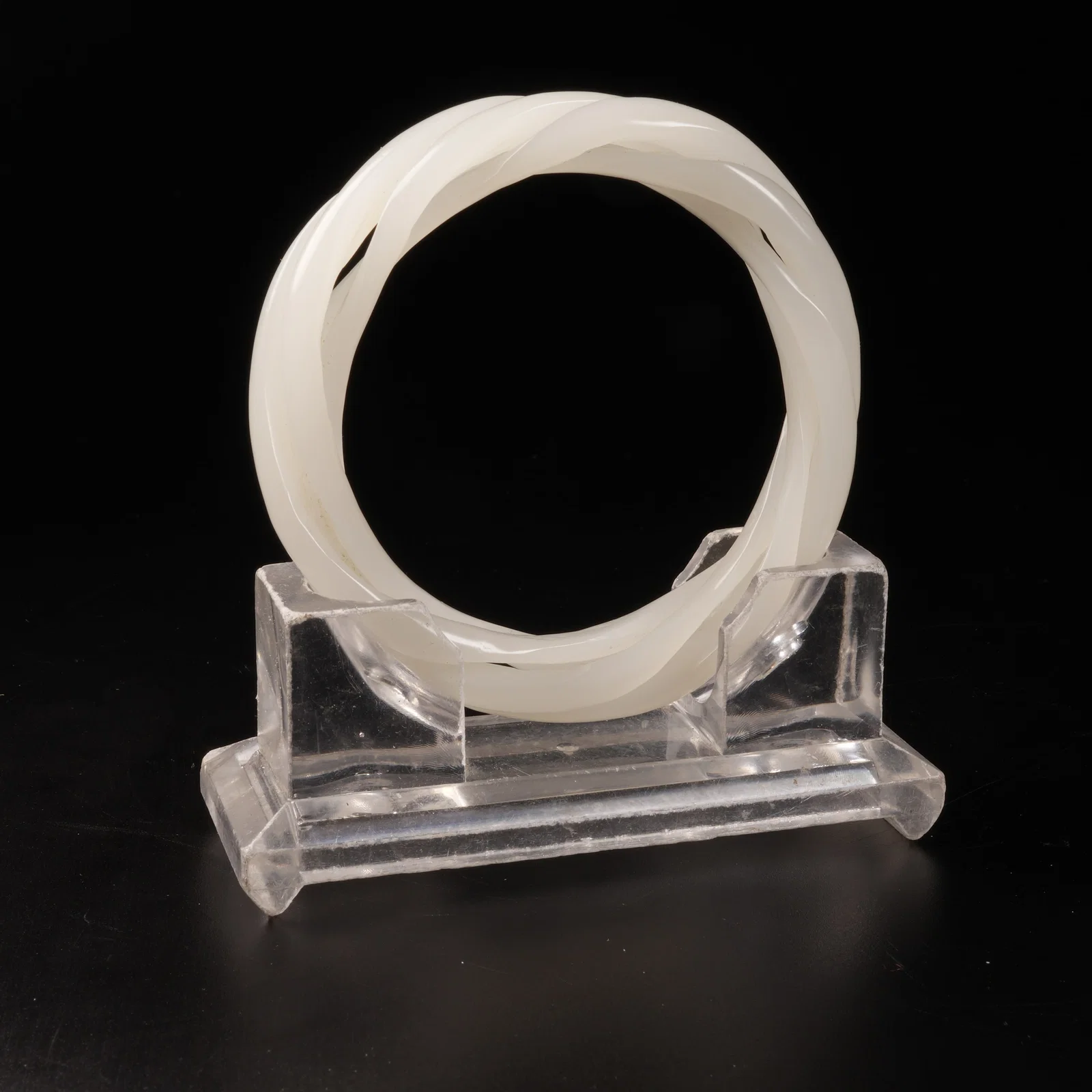 A HETIAN WHITE JADE FOUR-STRAND TWISTED-WIRE BRACELET