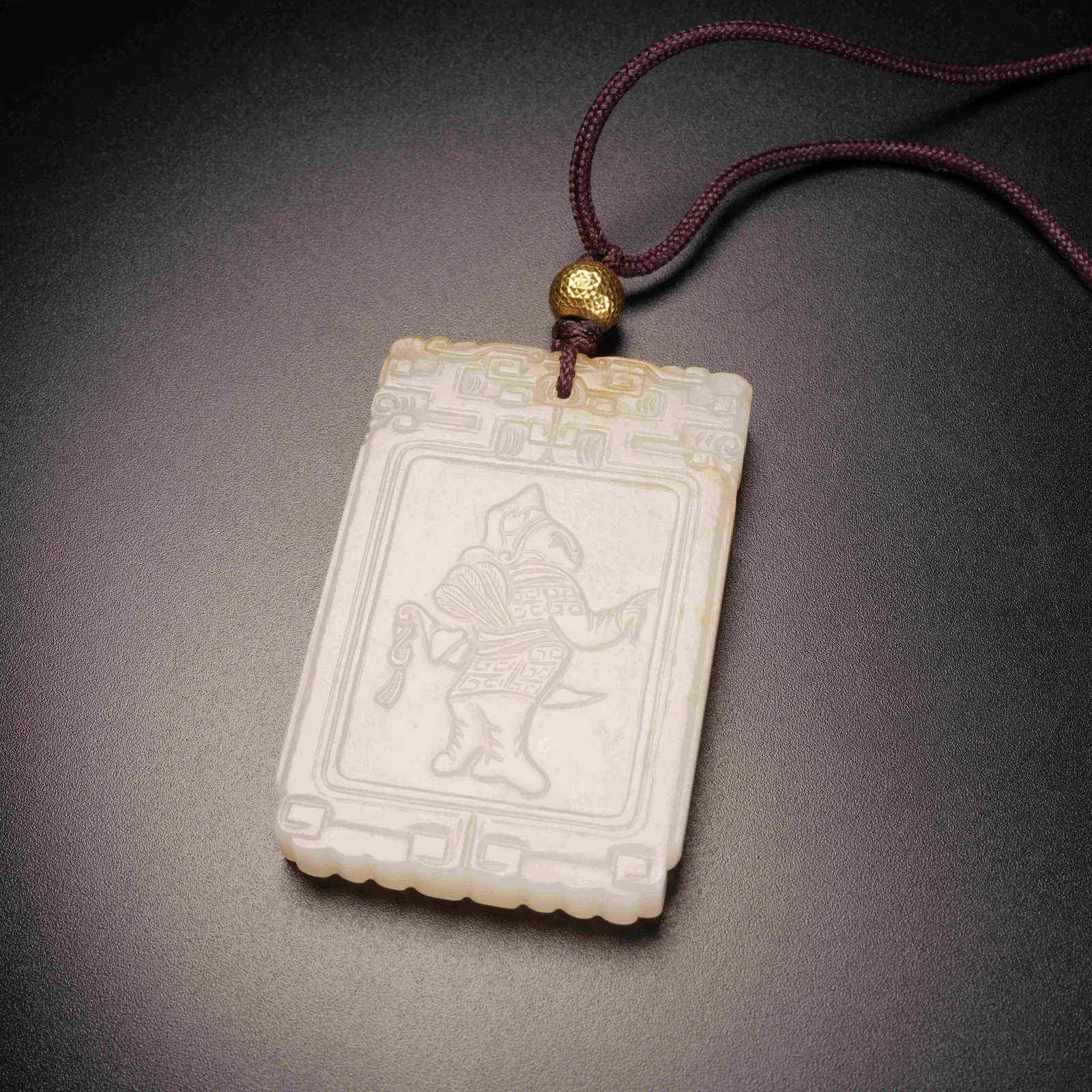 A HETIAN WHITE JADE "WUSHUANGPU" MOTIF PLAQUE