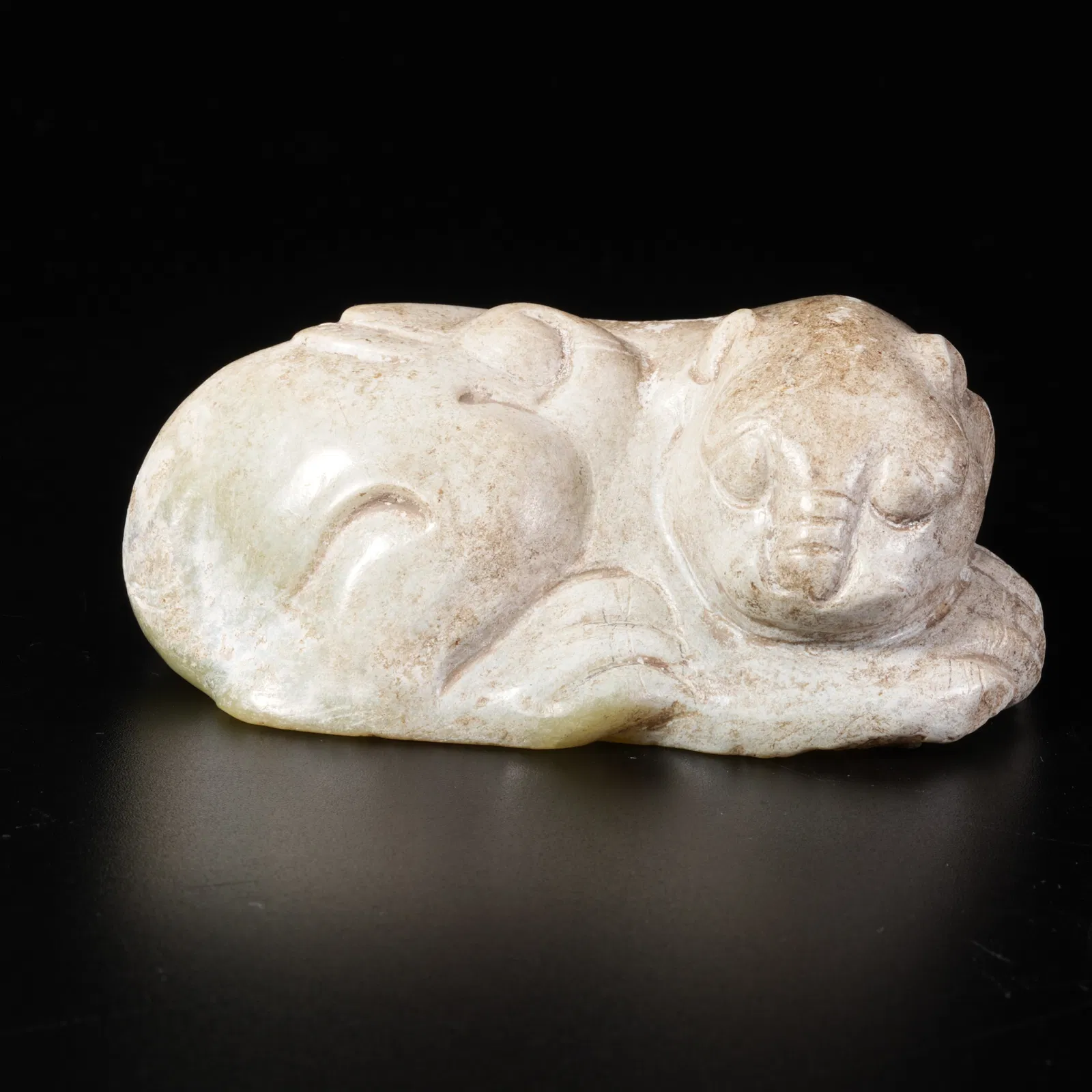 A HETIAN YELLOW JADE TIGER ORNAMENT
