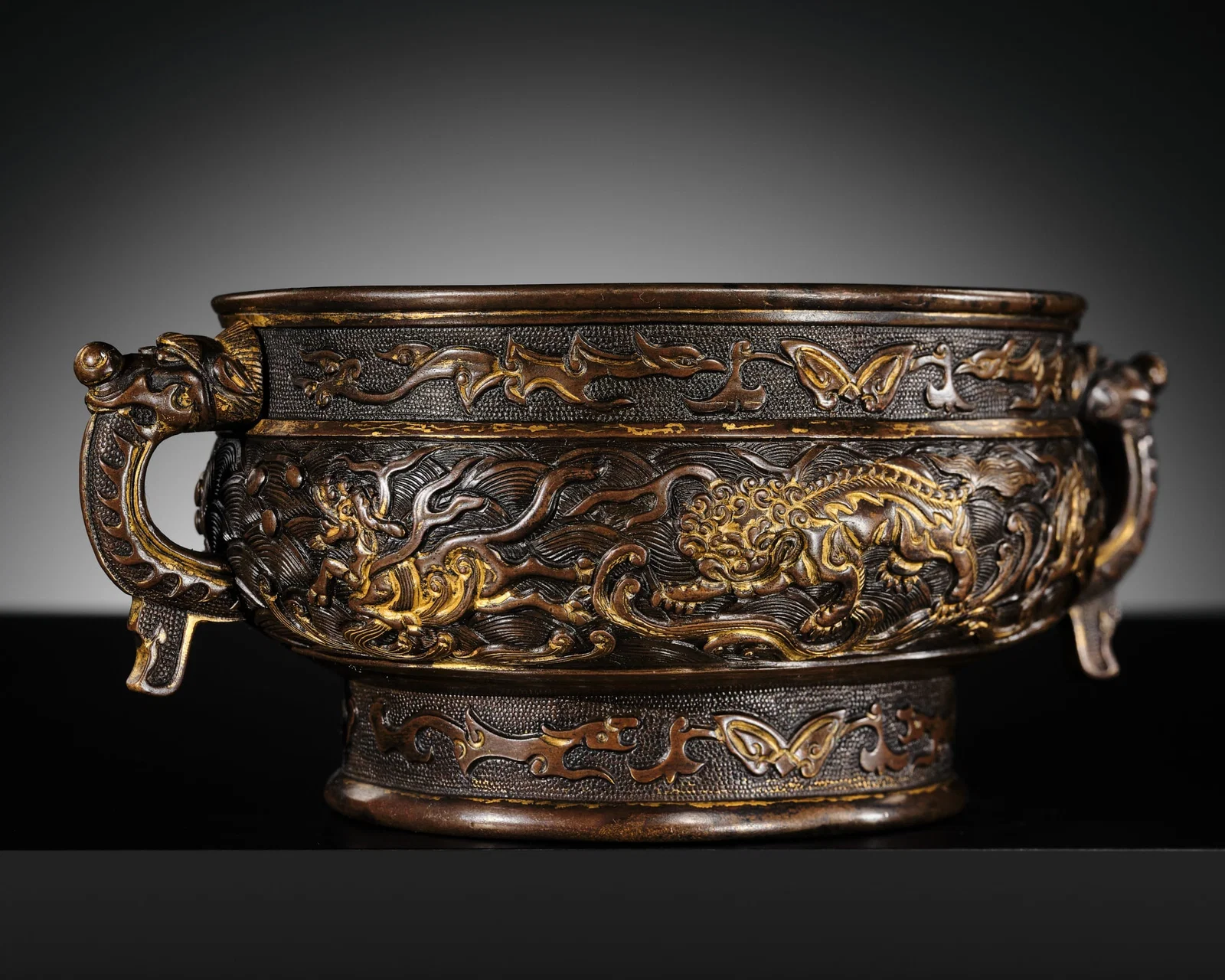A HU WENMING PARCEL-GILT BRONZE 'BUDDHIST LIONS' CENSER, GUI, MING DYNASTY