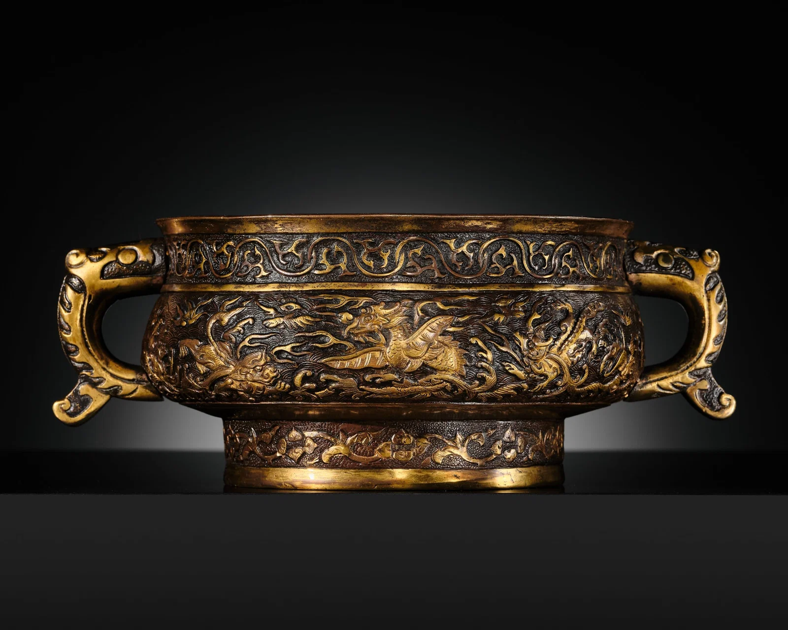 A HU WENMING PARCEL-GILT BRONZE 'TEN MYTHICAL BEASTS' CENSER, GUI, MING DYNASTY