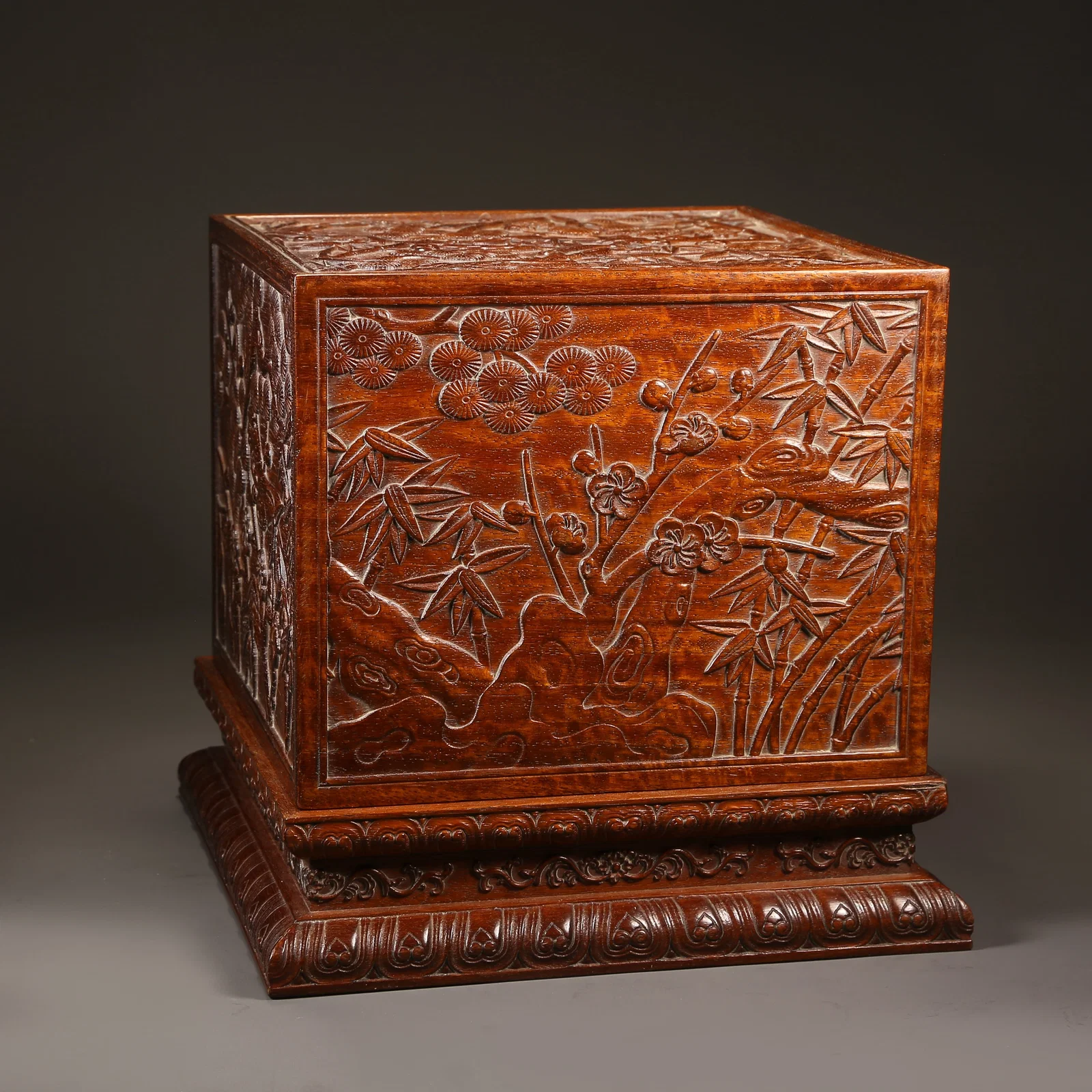 A HUANGHUALI SEAL BOX WITH "THREE FRIENDS OF WINTER" DESIGN