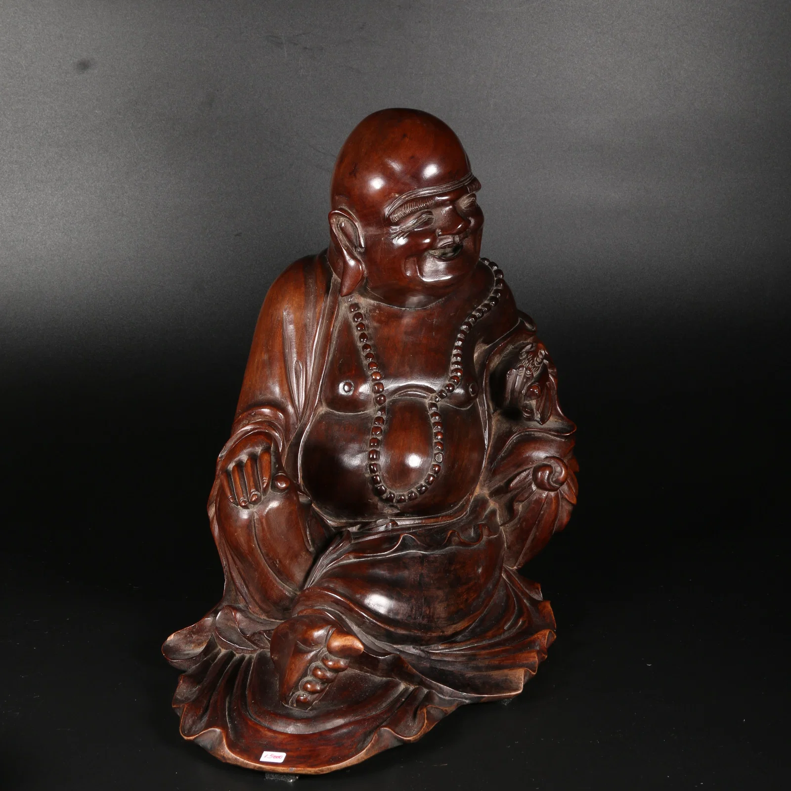 A HUANGHUALI WOOD MAITREYA BUDDHA STATUE