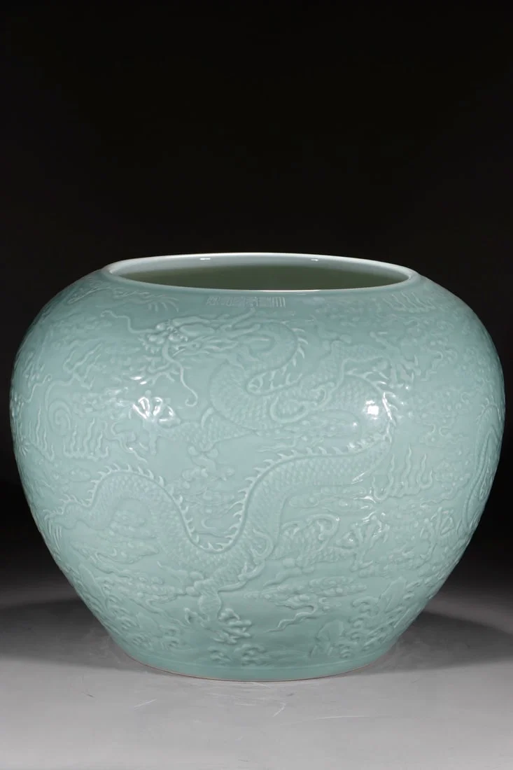 A Huge Celadon Glazed Auspicious Cloud and Dragon Pattern Vat