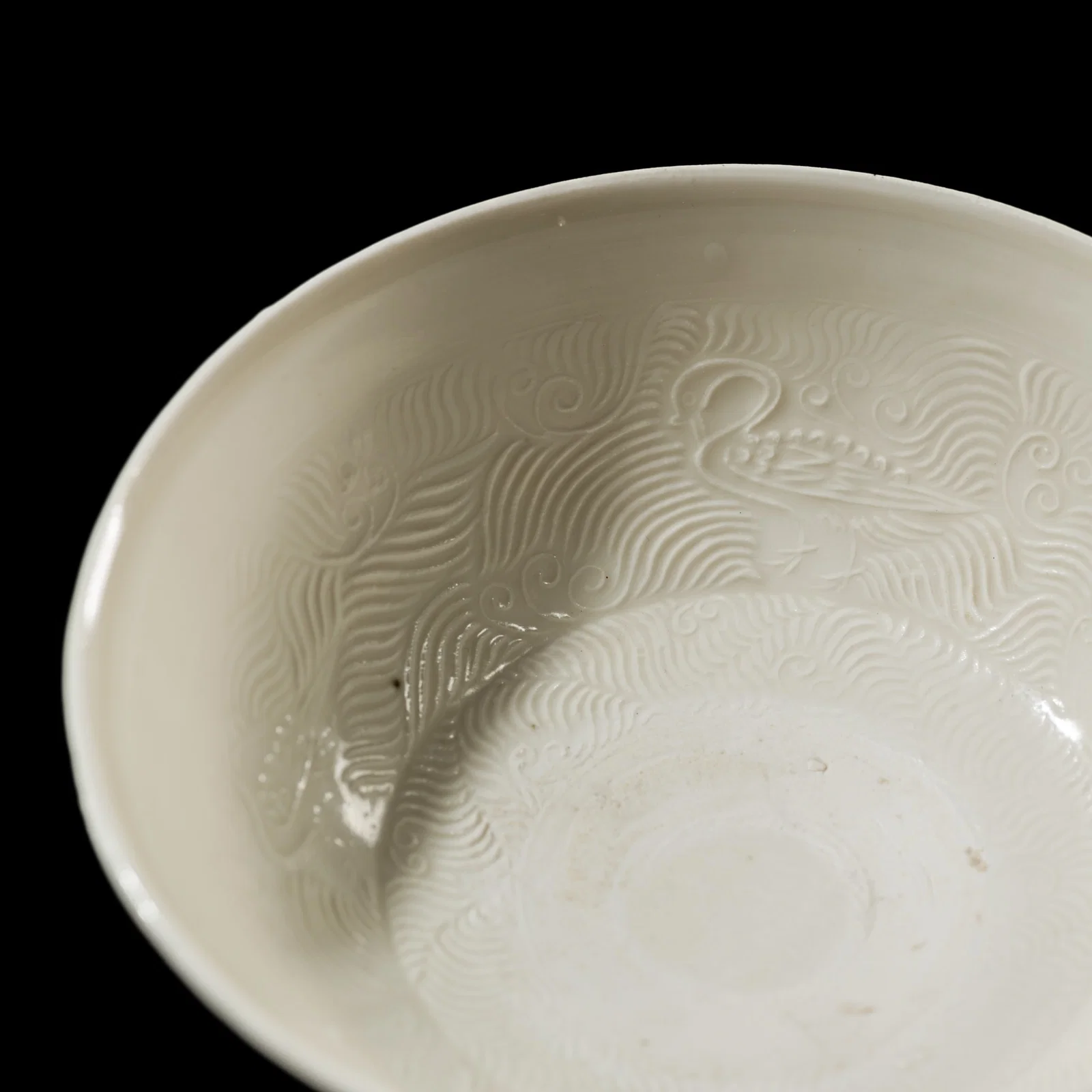 A HUOZHOU WHITE-GLAZED 'GEESE' BOWL, JIN TO YUAN DYNASTY