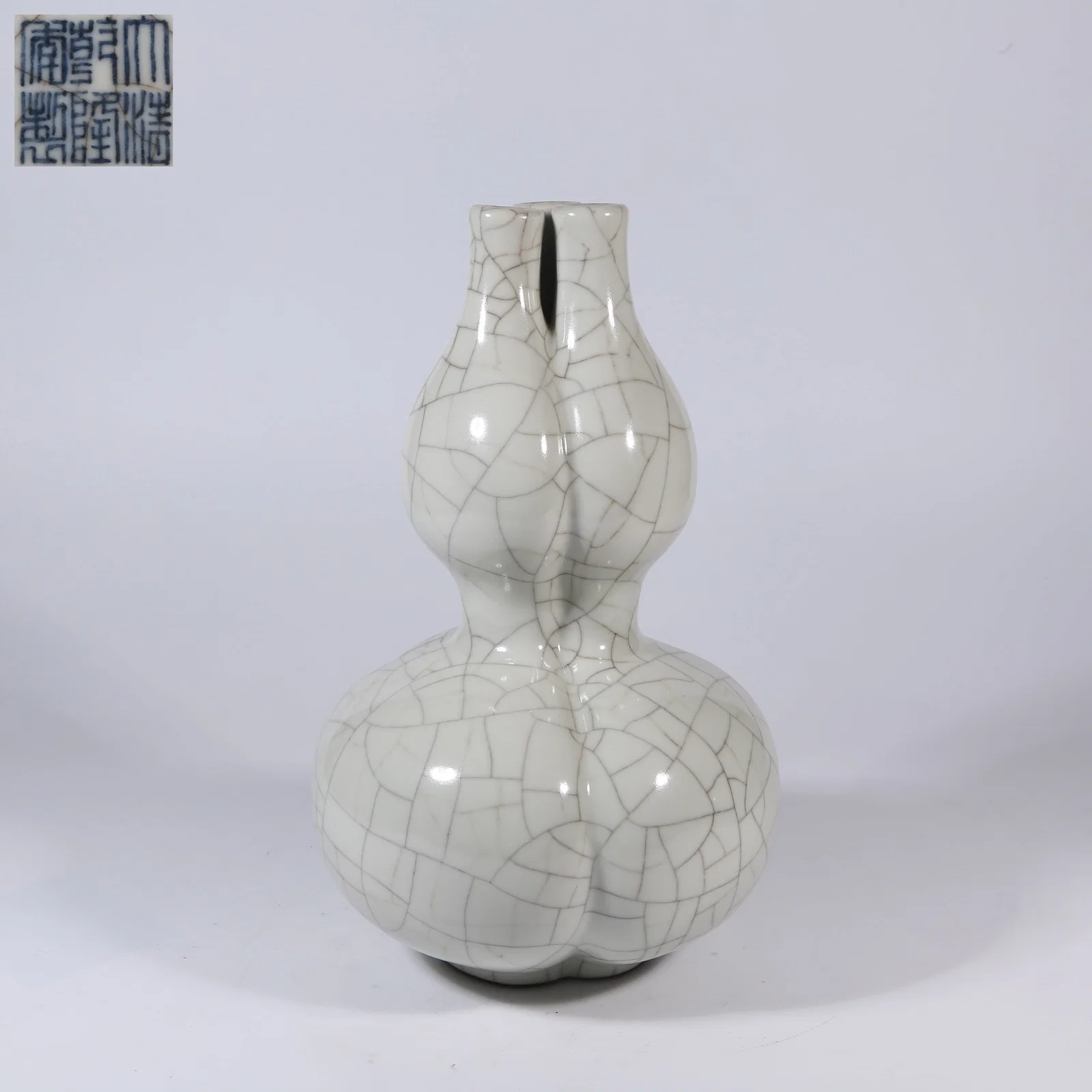 A IMITATION GUAN KILN THREE-HOLE GOURD VASE
