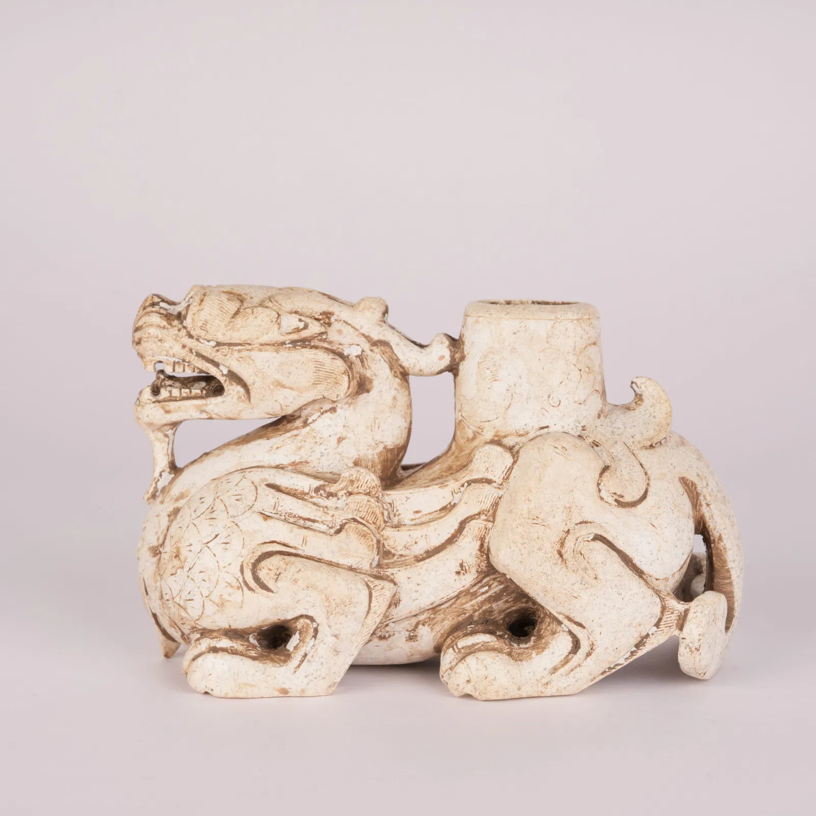 A JADE GUARDIAN FIGURE, WARRING STATES PERIOD