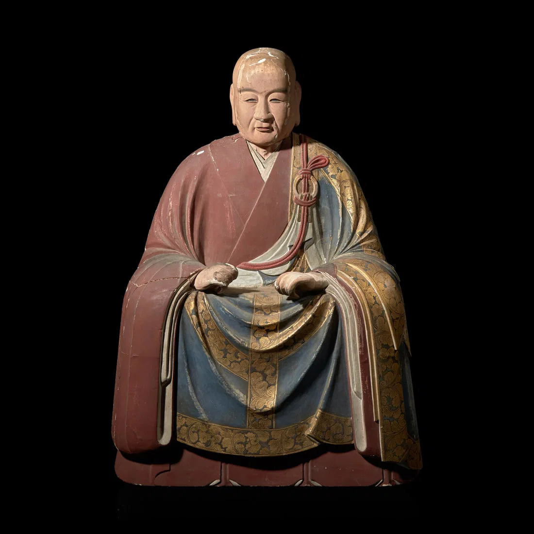 A Japanese Polychrome Painted Wood Figure of a Rakan