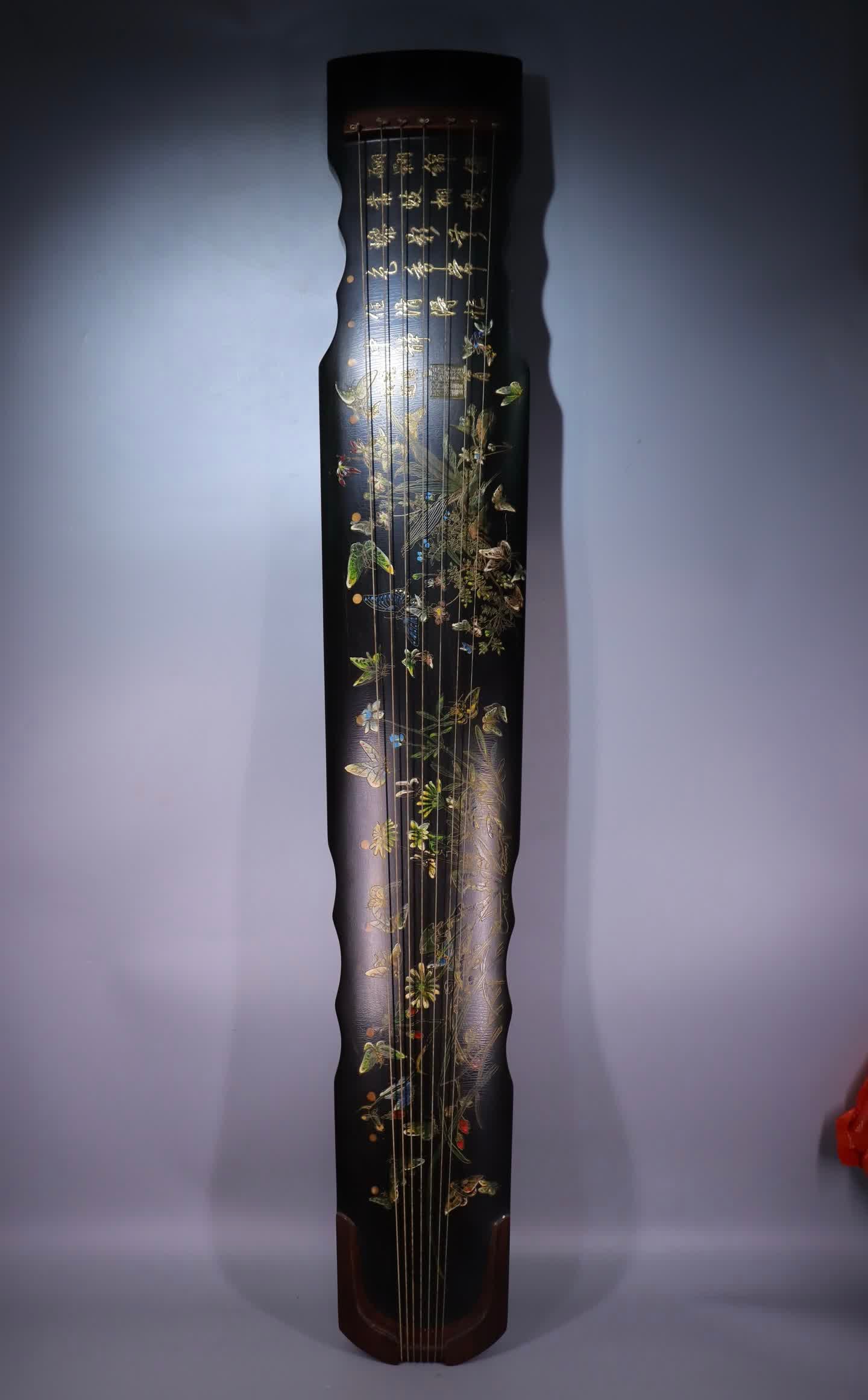 A lacquered gild painted guqin