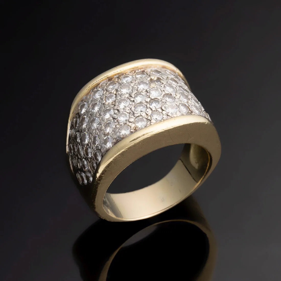 A LADY'S .75 TW DIAMOND AND 14K GOLD COCKTAIL RING