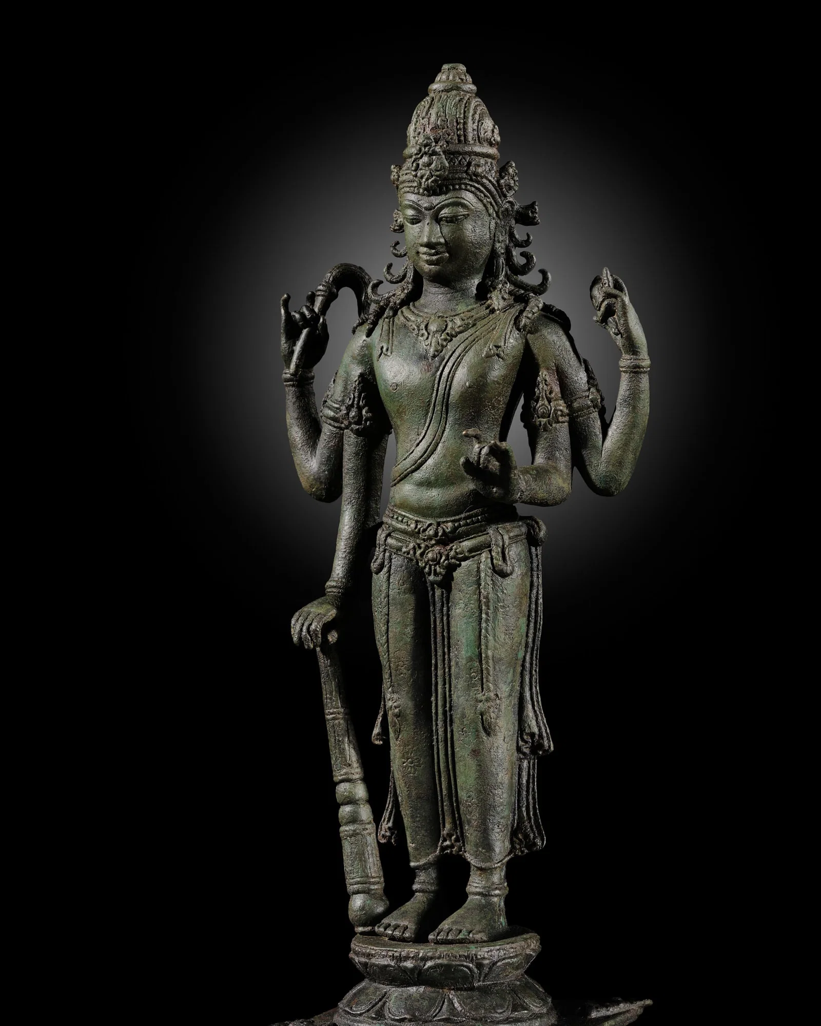A LARGE (45 CM) AND VERY RARE COPPER ALLOY FIGURE OF VISHNU, CENTRAL JAVA, 9TH-10TH CENTURY