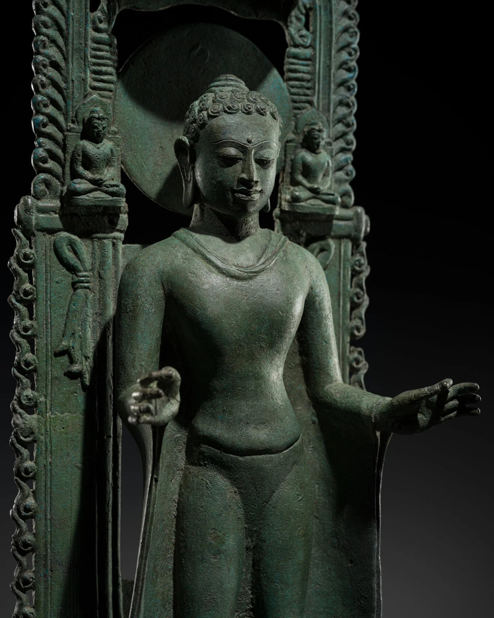 A LARGE AND HIGHLY IMPORTANT BRONZE FIGURE OF THE ENTHRONED BUDDHA, SRIVIJAYA EMPIRE, SUMATRA,