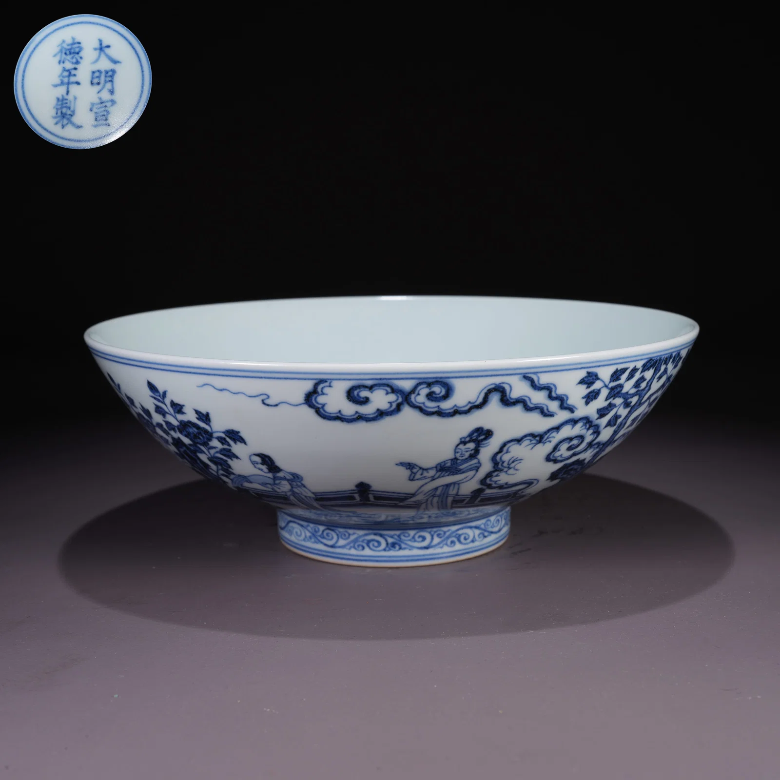 A LARGE BLUE-AND-WHITE BOWL WITH COURT LADY IN GARDEN SCENE