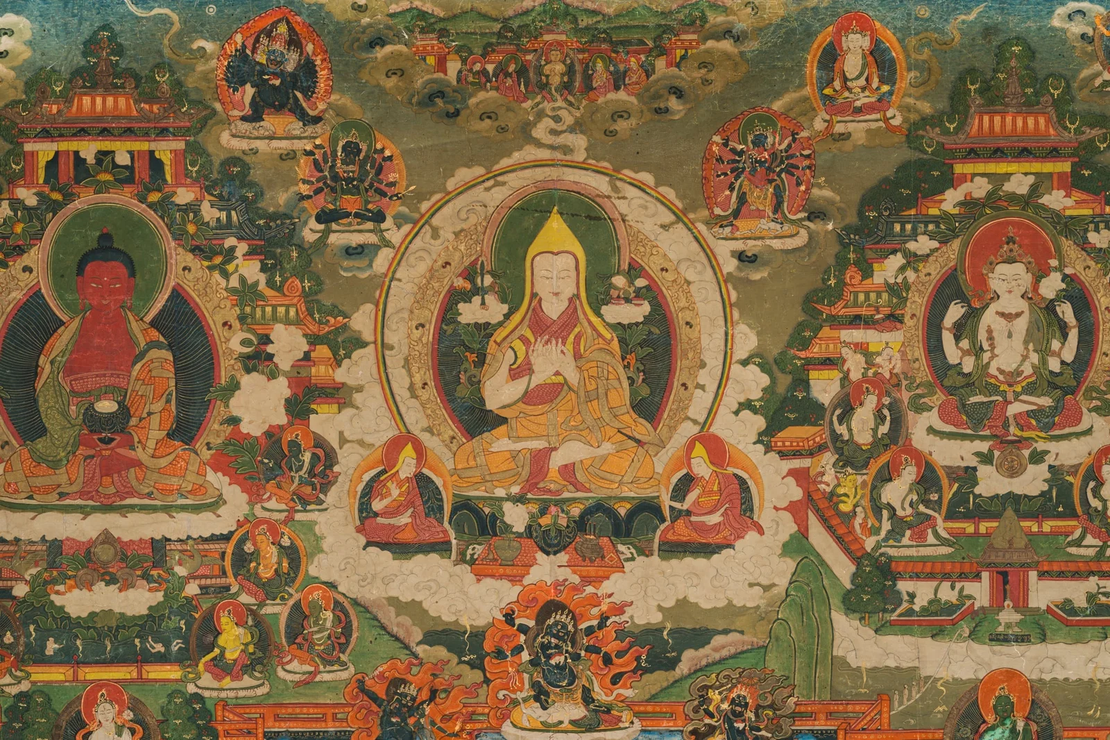 A LARGE HORIZONTAL THANGKA OF TSONGKHAPA WITH BUDDHA AMITABHA AND CHATURBHUJA AVALOKITESHVARA,