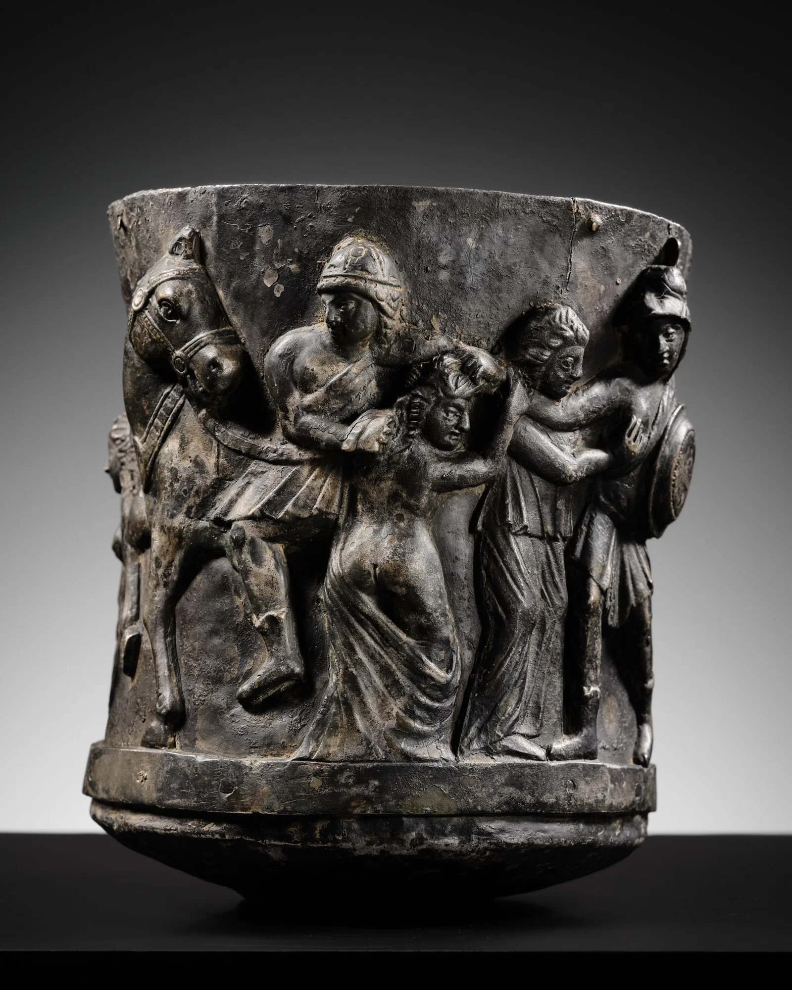 A LARGE SILVER REPOUSSÉ GOBLET DEPICTING THE ABDUCTION OF WOMEN, ANCIENT REGION OF GANDHARA,