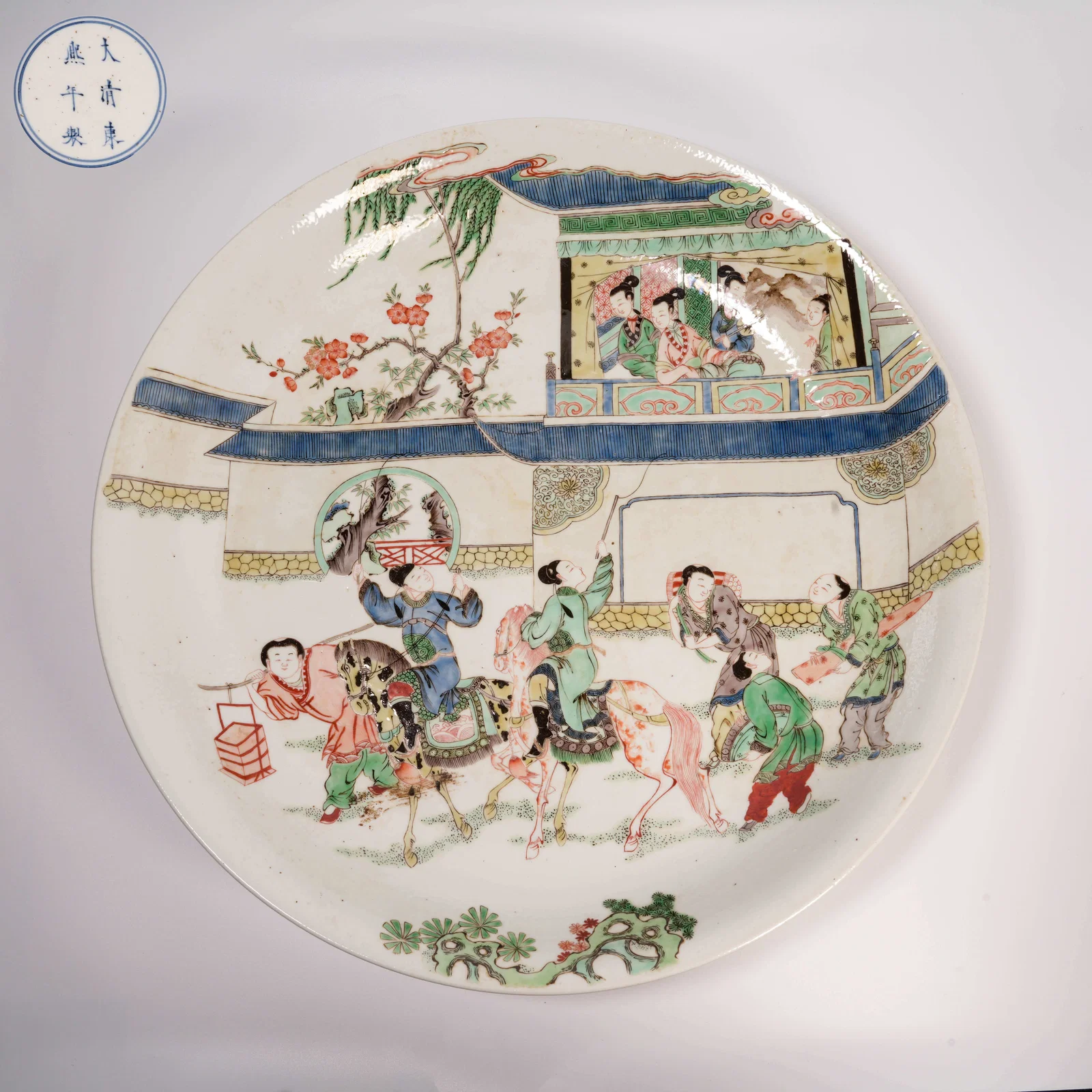 A LARGE WUCAI PLATE WITH FIGURAL STORY SCENE