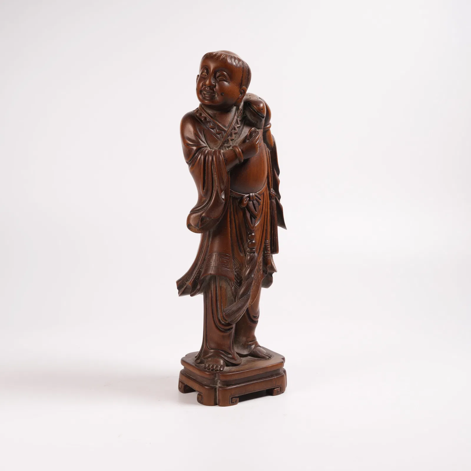 A LIU HAI PLAYING WITH GOLDEN TOAD FIGURINE