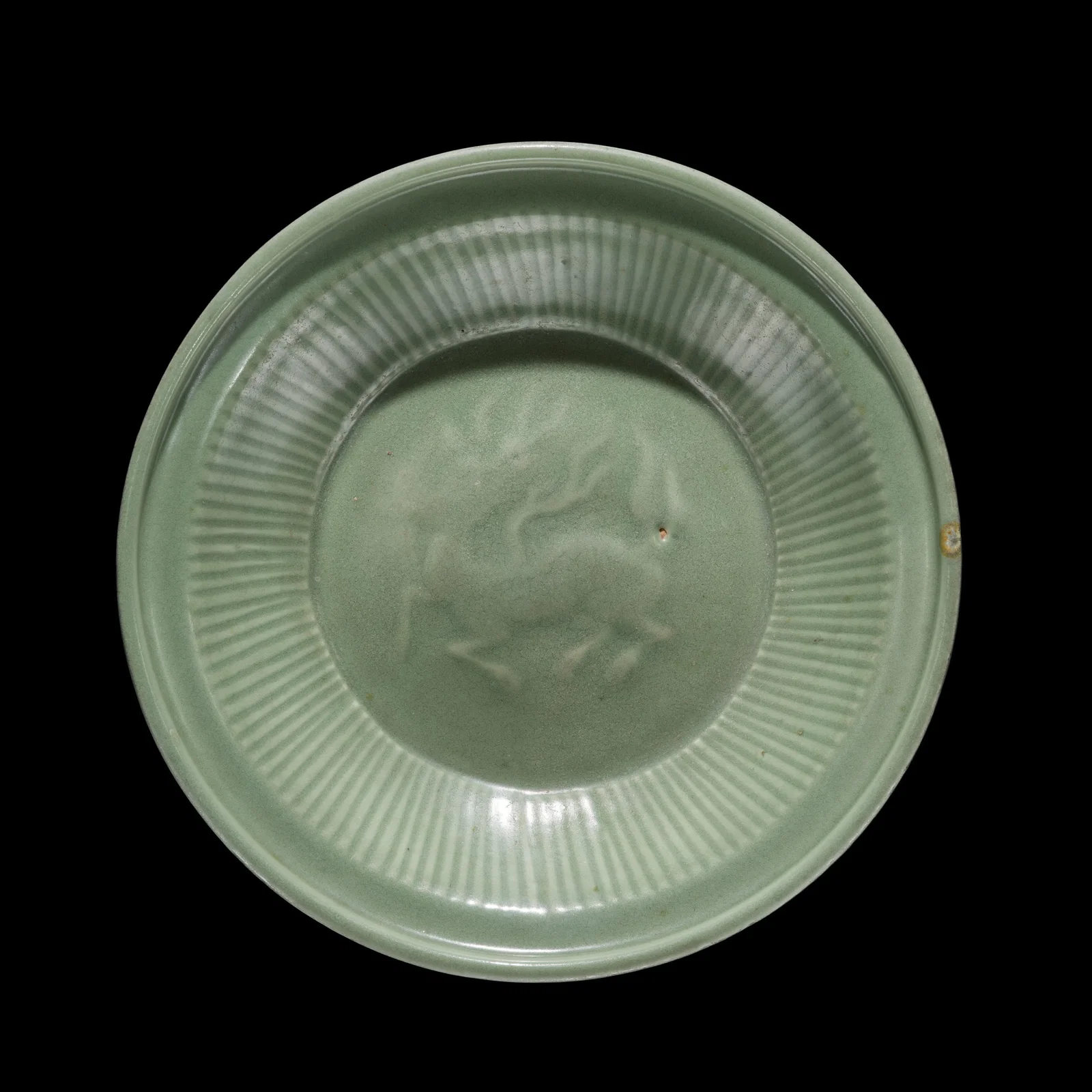 A LONGQUAN CELADON 'QILIN' DISH, YUAN DYNASTY