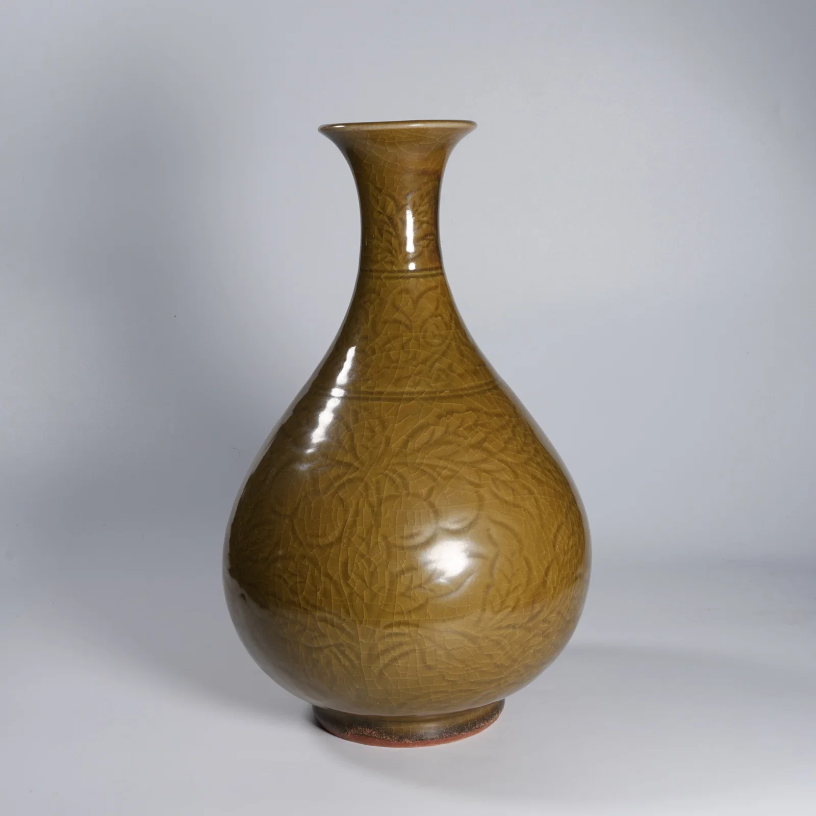 A LONGQUAN WARE YUHUCHUNPING VASE WITH SCROLLING FLOWER-AND-FRUIT MOTIFS