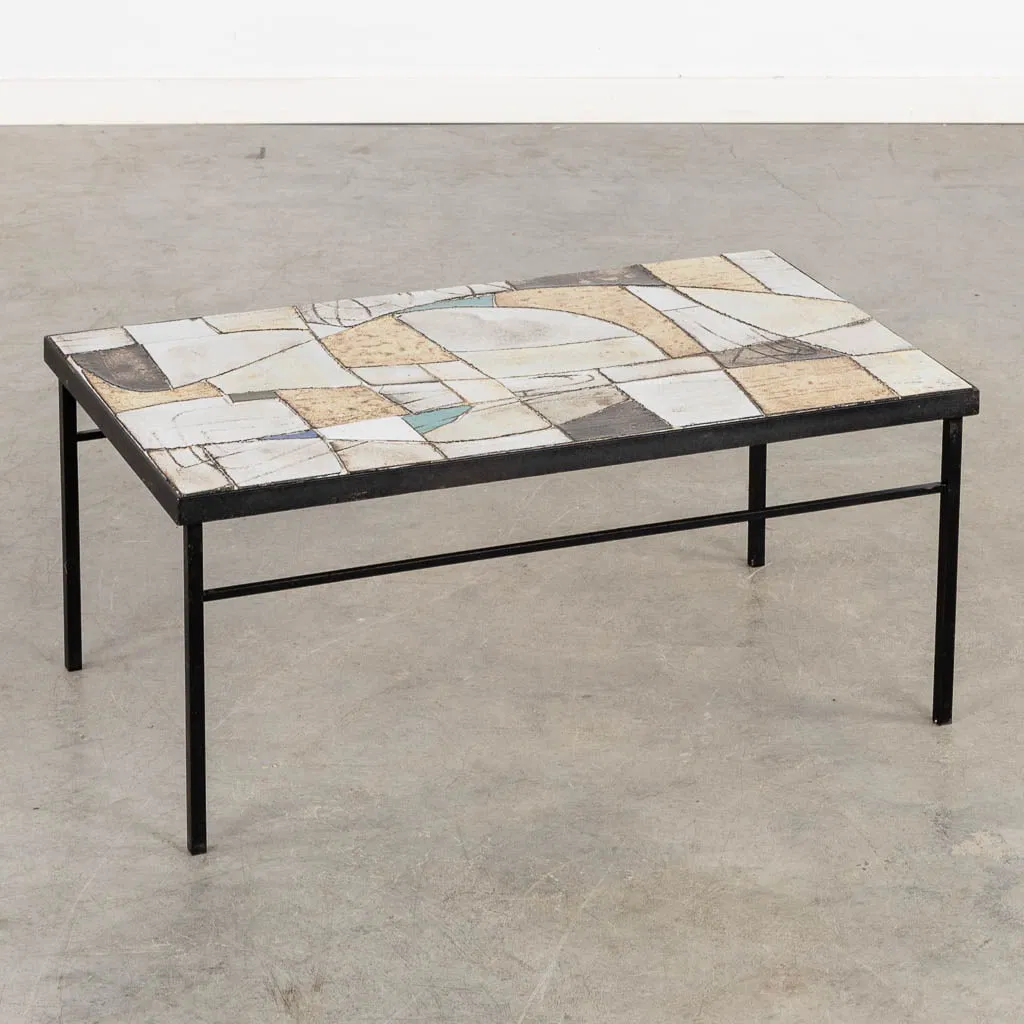 A mid-century coffee table, metal with ceramic tiles. Circa 1960.