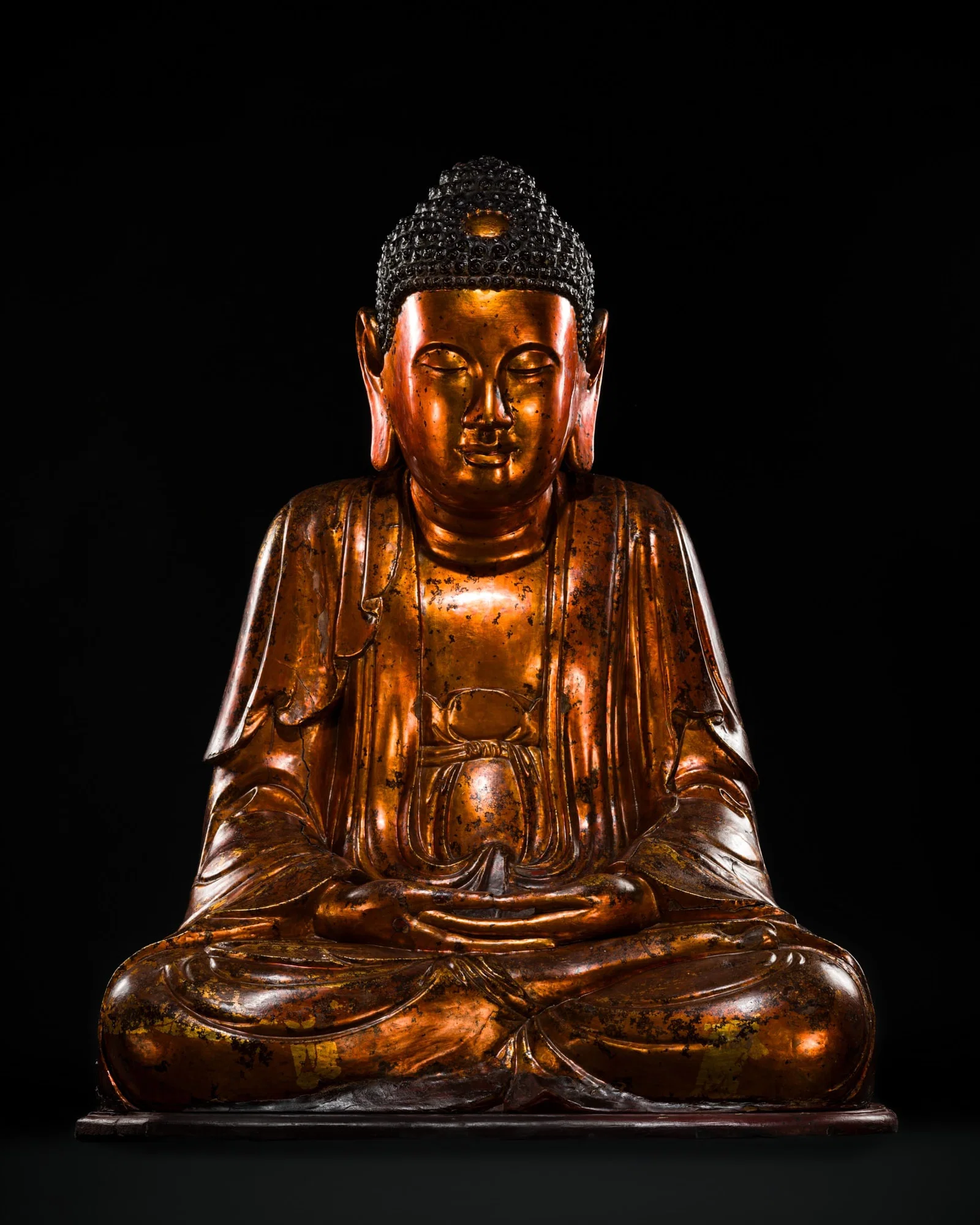 A MONUMENTAL (100 CM) AND VERY RARE GILT-LACQUERED WOOD STATUE OF BUDDHA, VIETNAM, 17TH-18TH CENTURY