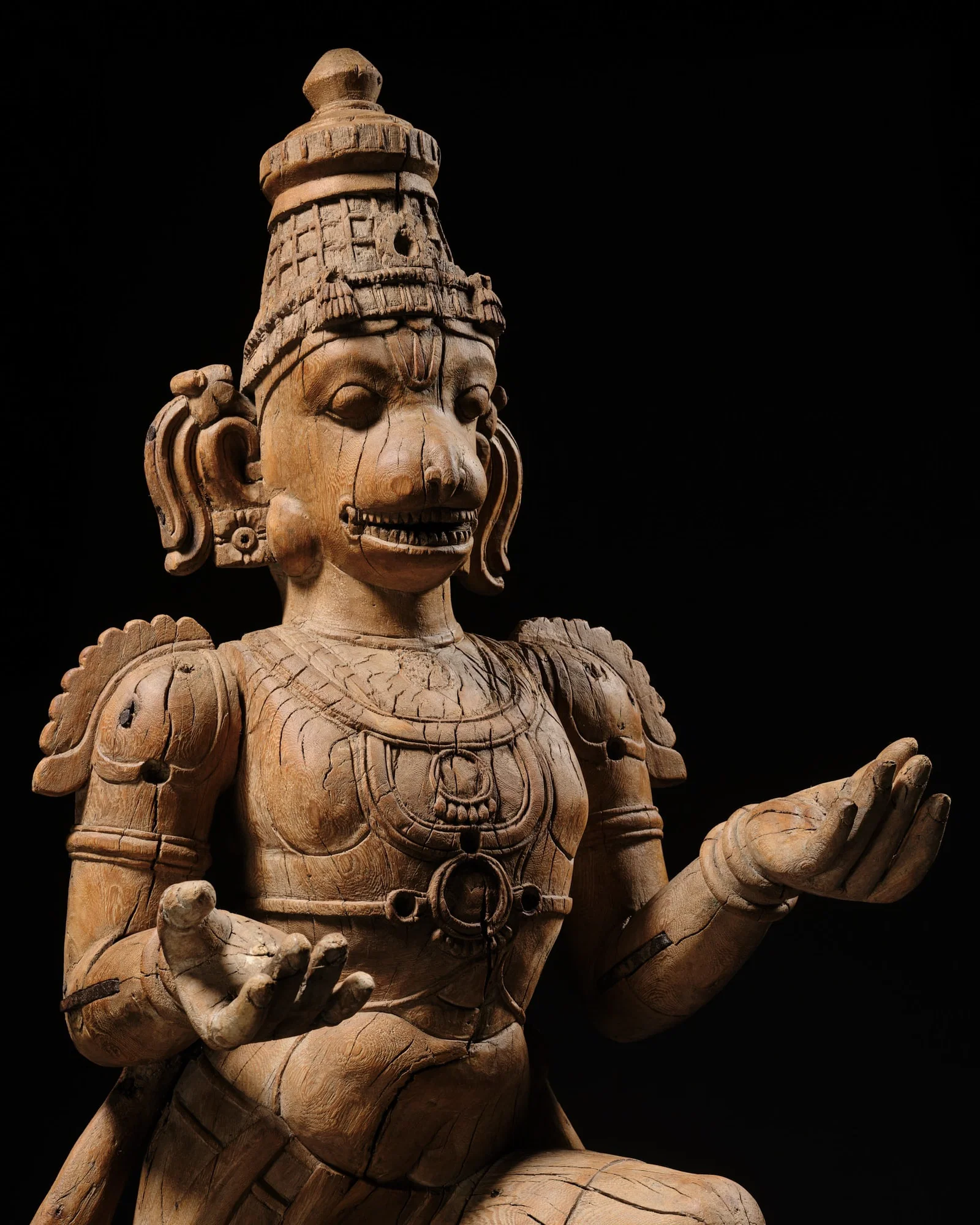 A MONUMENTAL (142 CM) WOOD FIGURE OF HANUMAN, TAMIL NADU, SOUTH INDIA, 18TH-19TH CENTURY