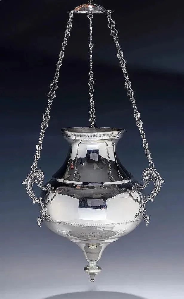 A MONUMENTAL SOLID SILVER ETERNAL LIGHT FOR AN ARON KODESH