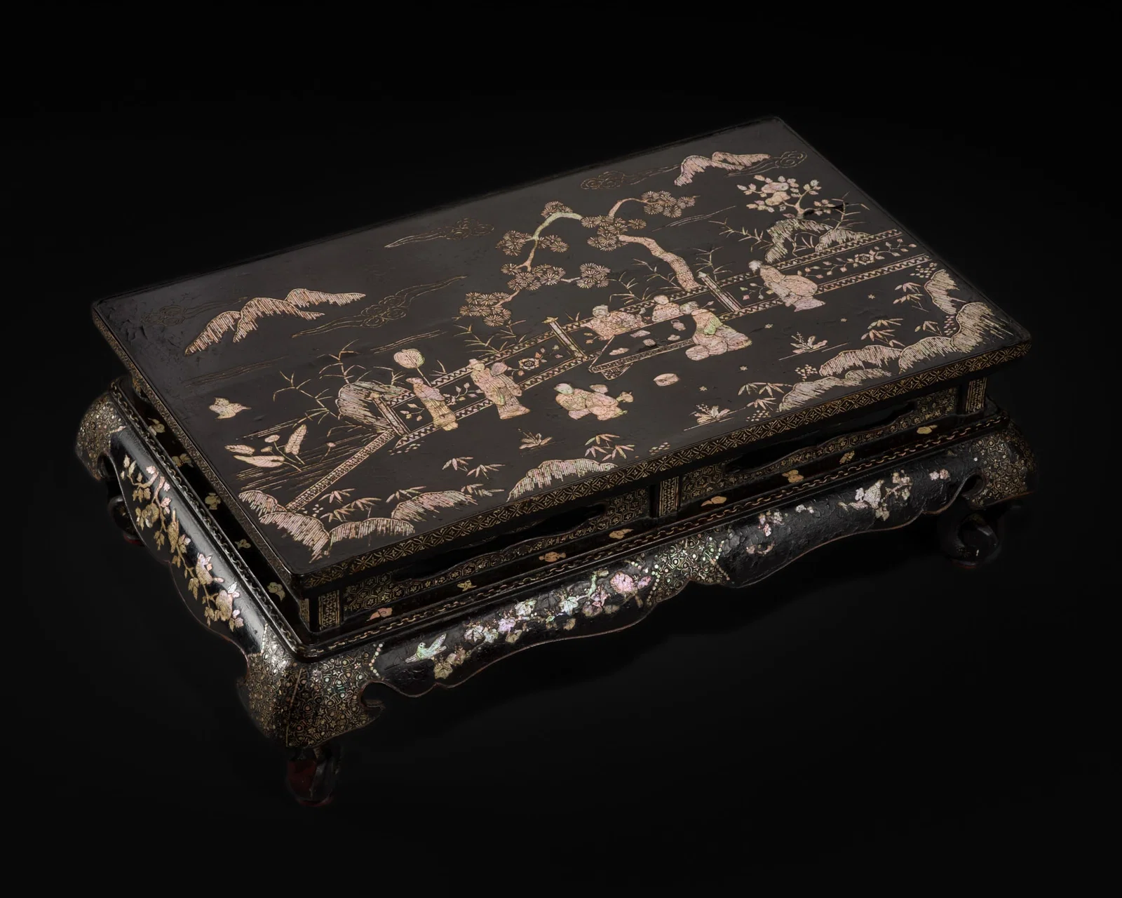 A MOTHER-OF-PEARL-INLAID BLACK LACQUER KANG TABLE, LATE MING TO EARLY QING DYNASTY