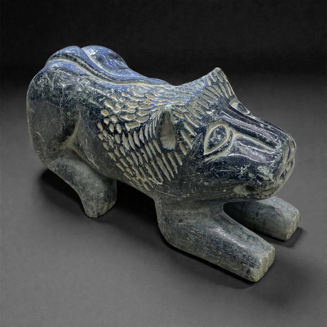 A Near Eastern Schist Recumbent Feline Effigy, 2nd-1st Millennium BCE, 378g, 47AA