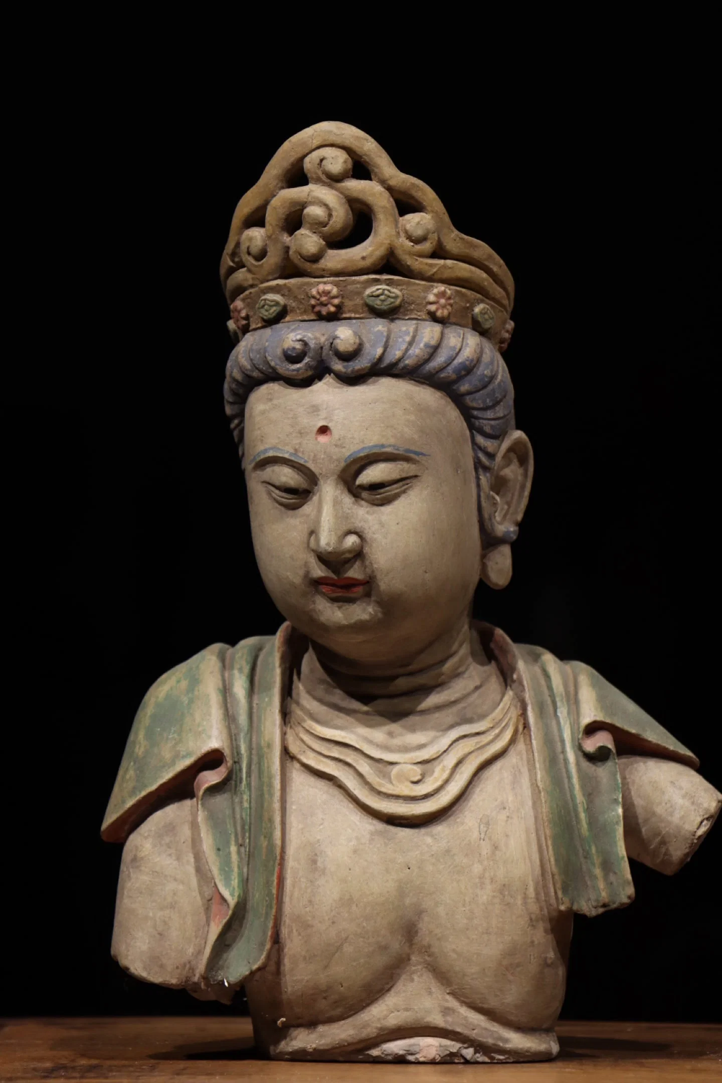 A PAINTED CLAY BUST OF A BODHISATTVA, MING DYNASTY, 14TH–15TH CENTURY