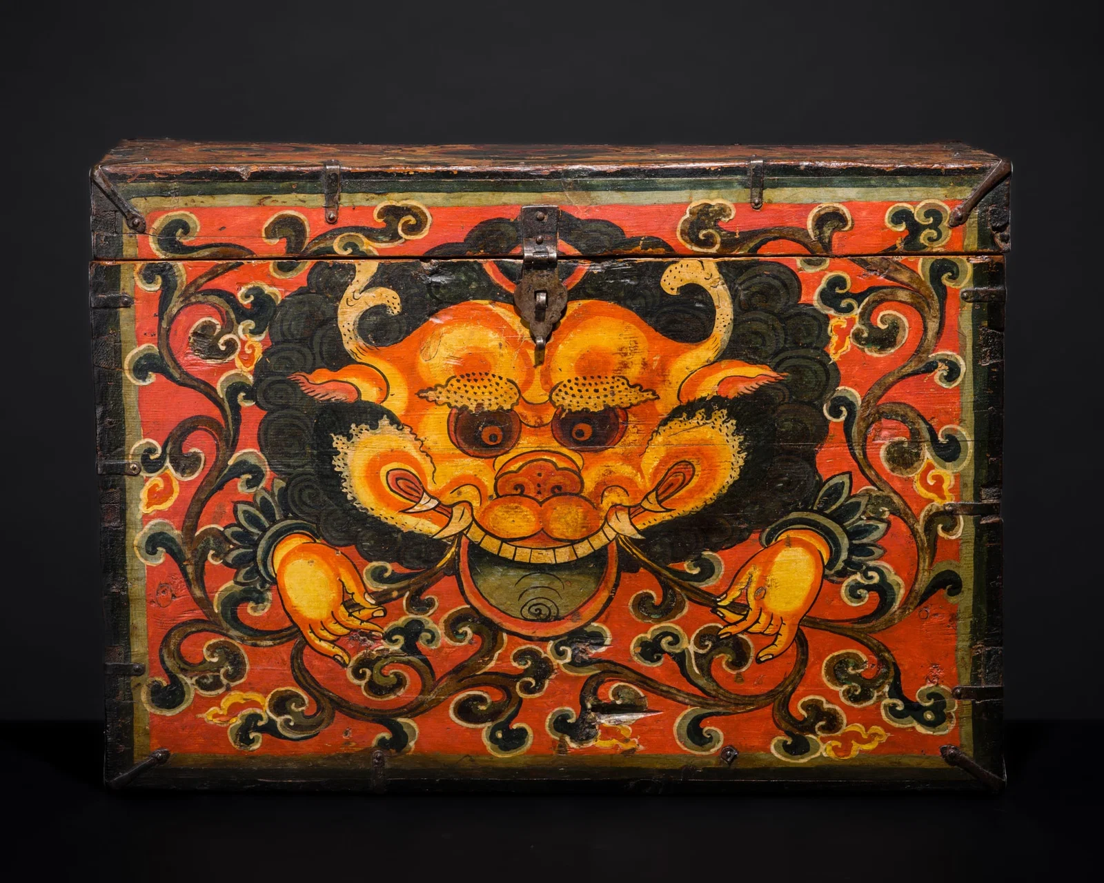 A PAINTED WOOD 'KIRTIMUKHA' STORAGE CHEST, EASTERN TIBET, 18TH-19TH CENTURY