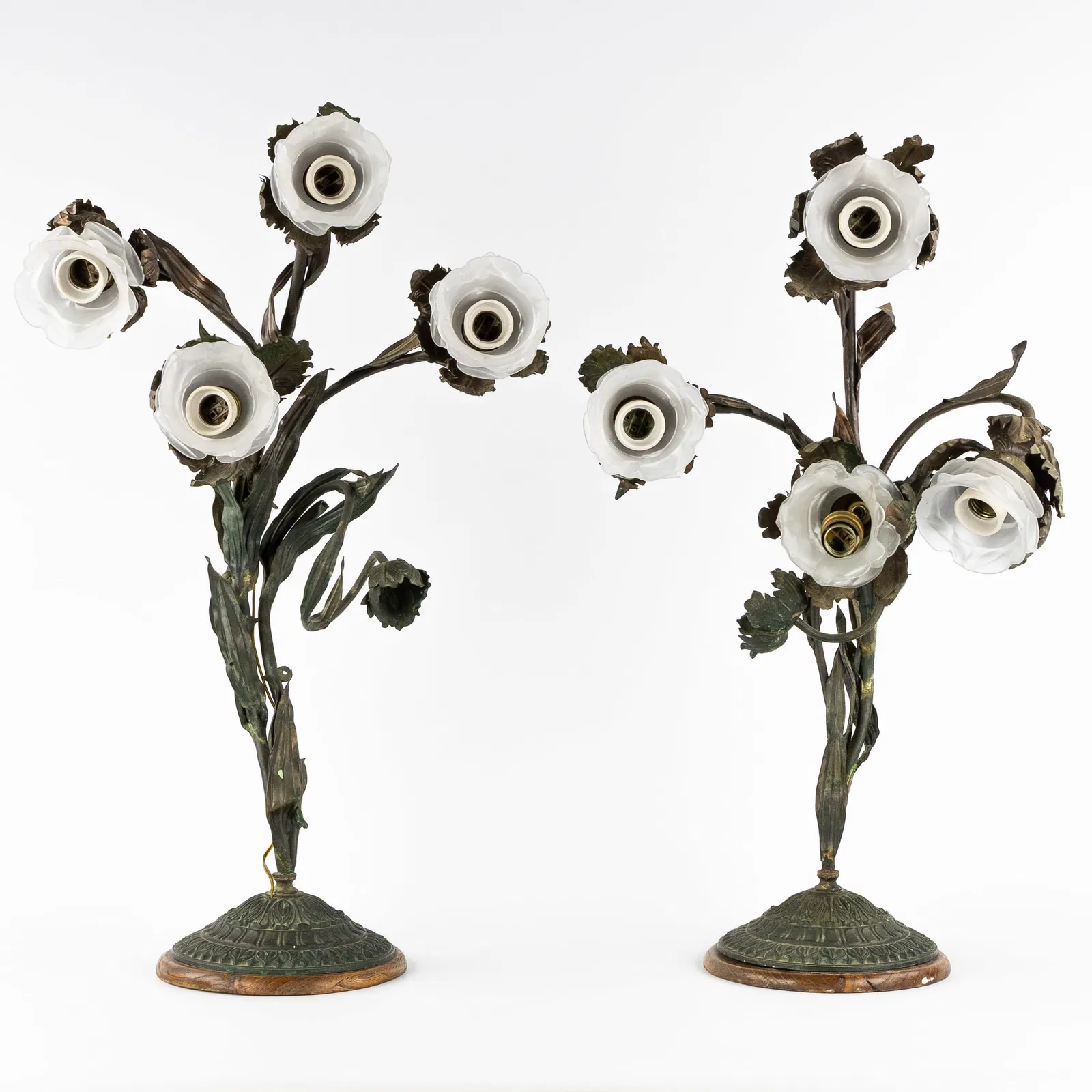 A Pair of Art Nouveau table lamps, brass and frosted glass, circa 1900.