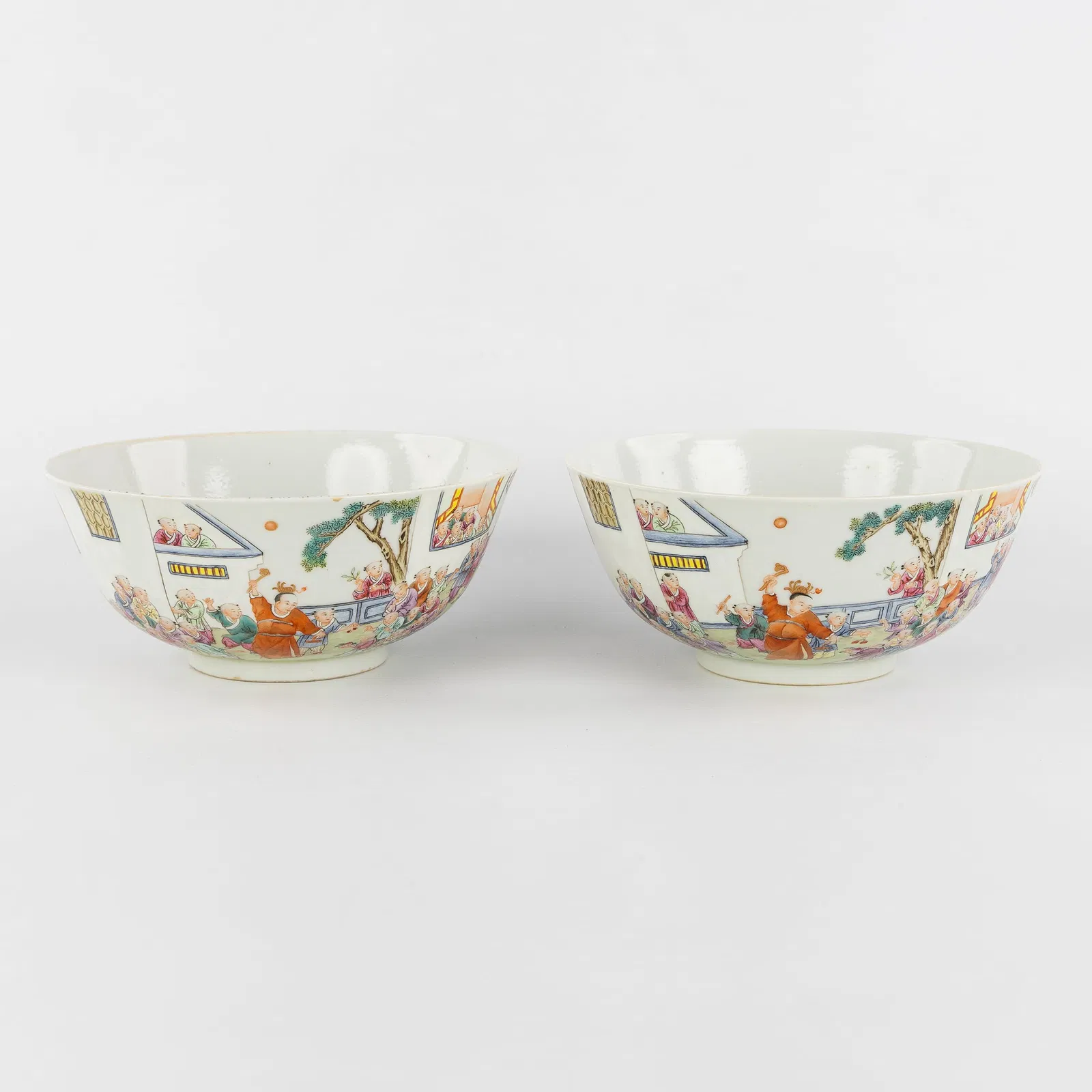 A Pair of Chinese '100 Boys' bowls, Famille Rose, Jiaqing marked.