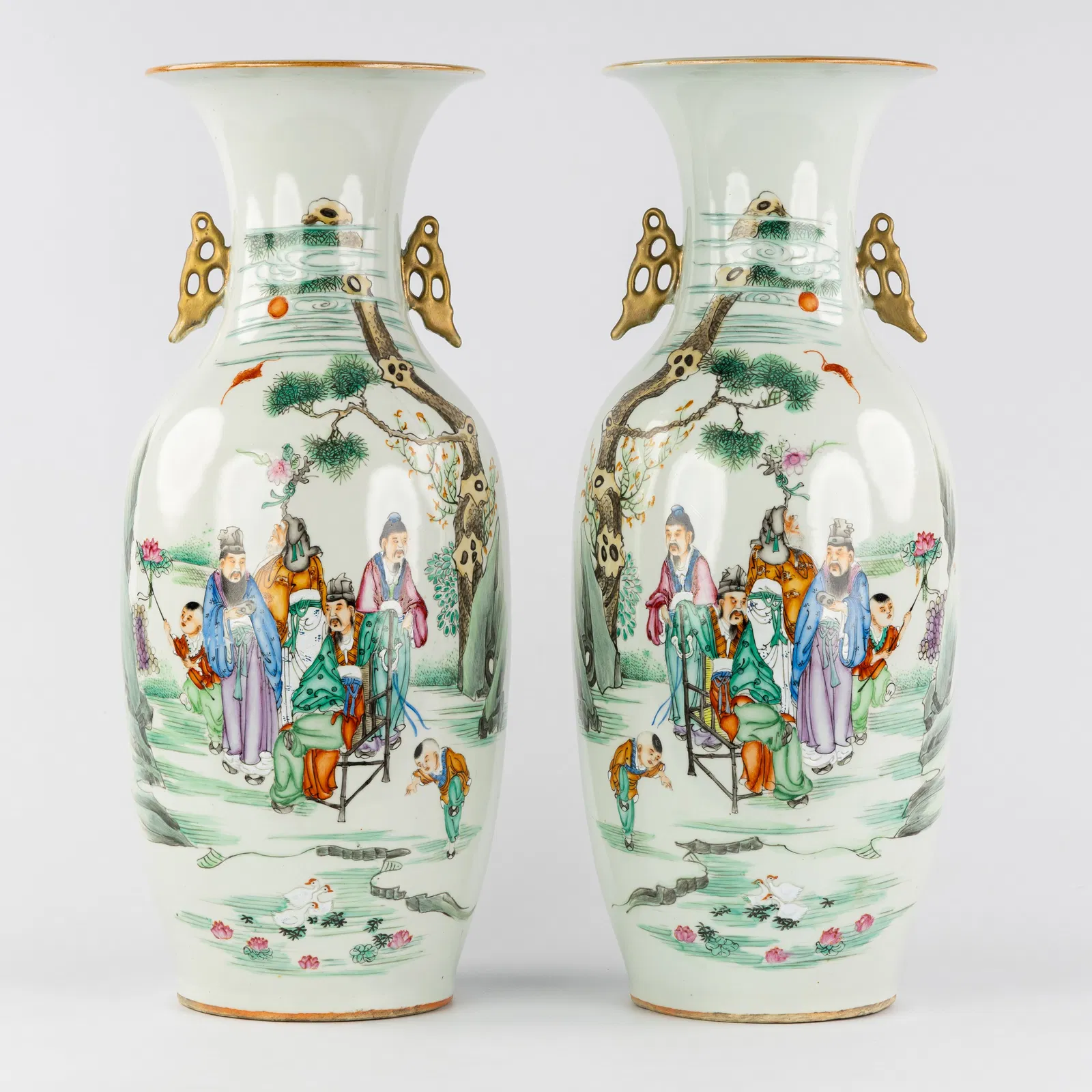 A Pair of Chinese vases, Famille Rose, decorated with figurative scenes, 19th/20th C.