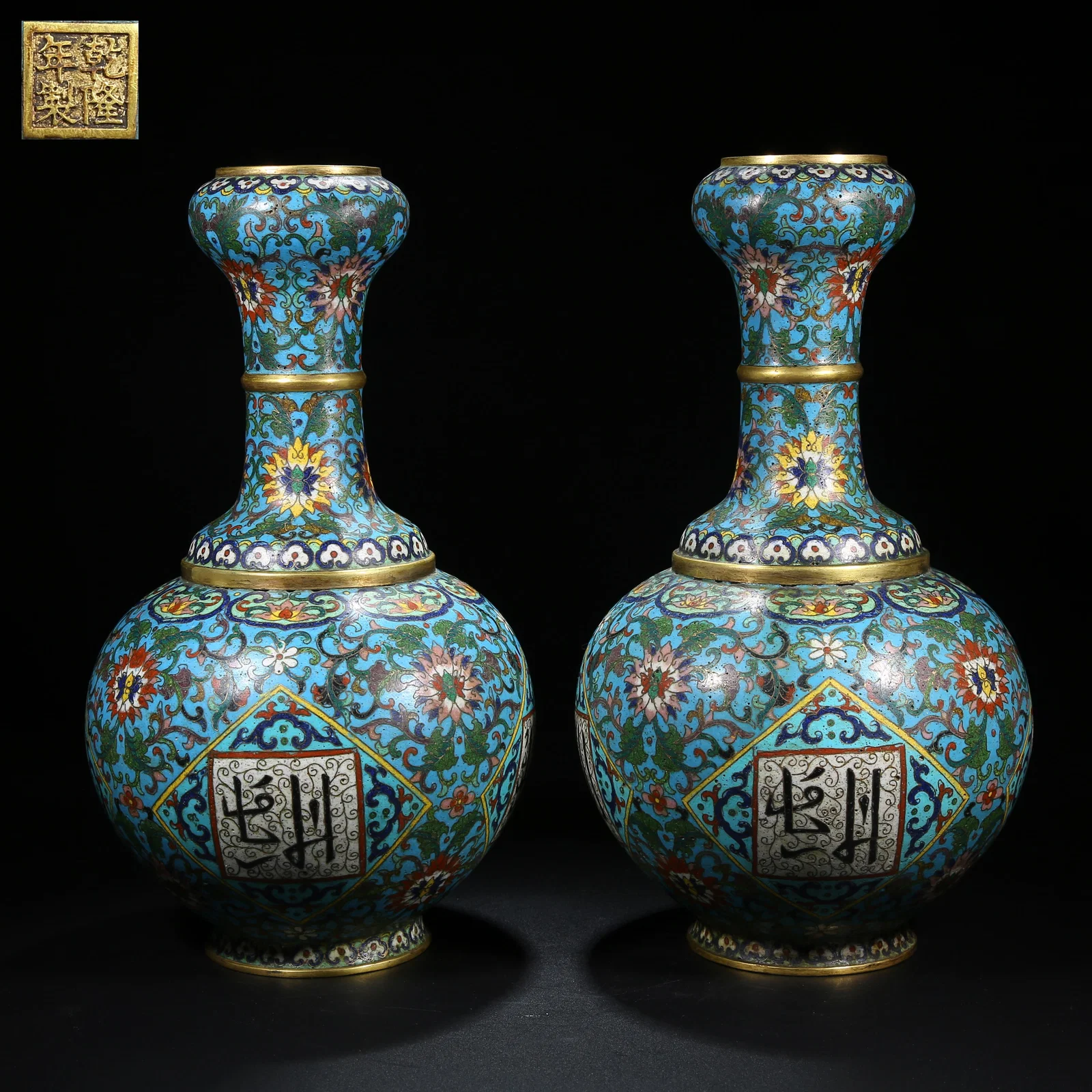 A PAIR OF CLOISONNÉ ENAMEL GARLIC-HEAD VASES ON BRONZE