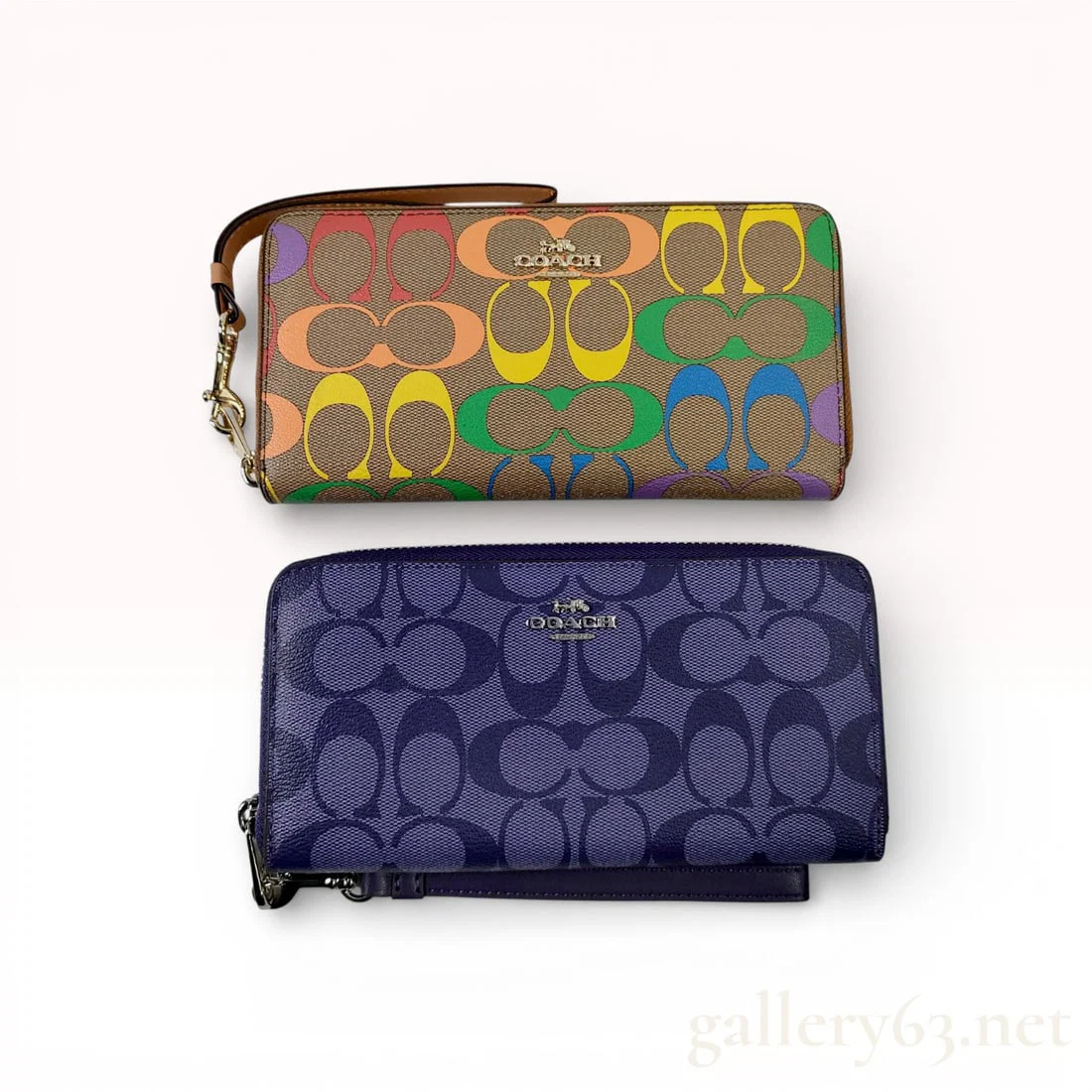 A Pair of Coach Long Zip Around Wallets in Signature Canvas