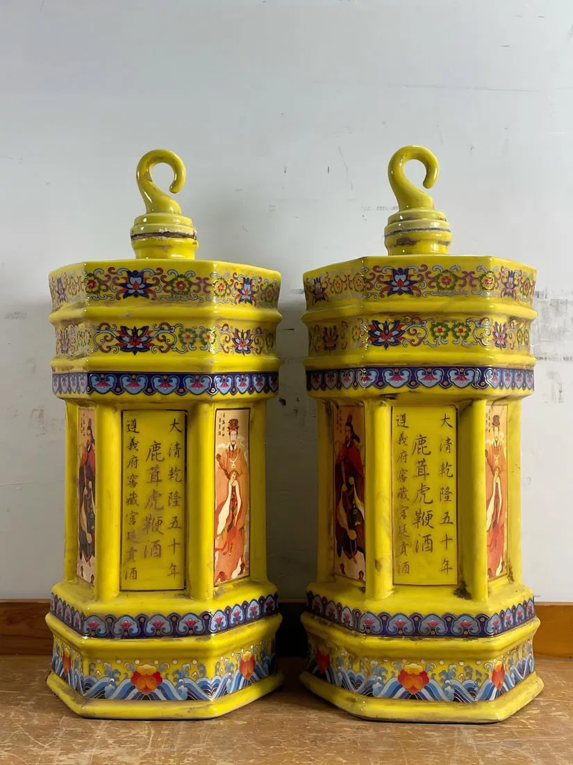 A pair of collectible Five Gods of Wealth bottles containing deer antler and tiger penis wine