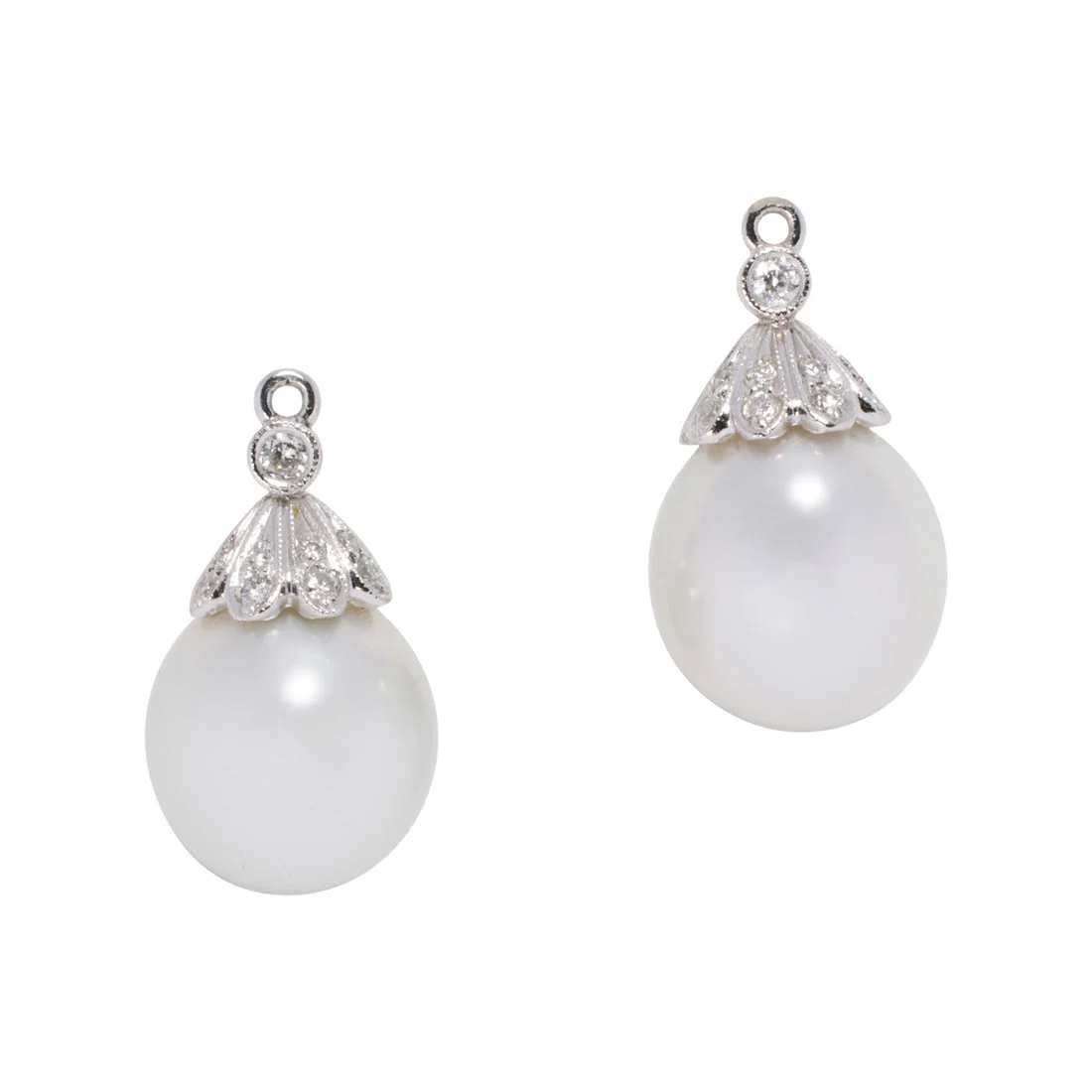 A pair of cultured pearl, diamond, and 10k white gold earring enhancers