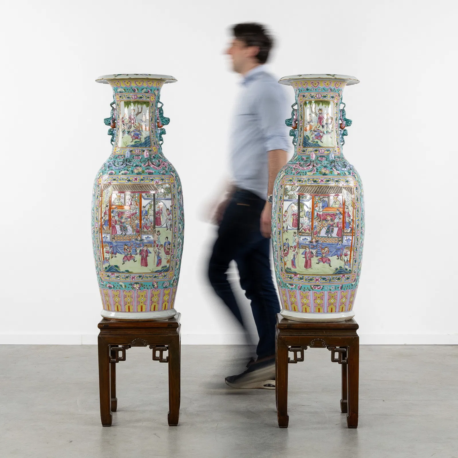 A Pair of Exceptionally Large Chinese vases, Famille Rose, richly decorated with Palace scenes and