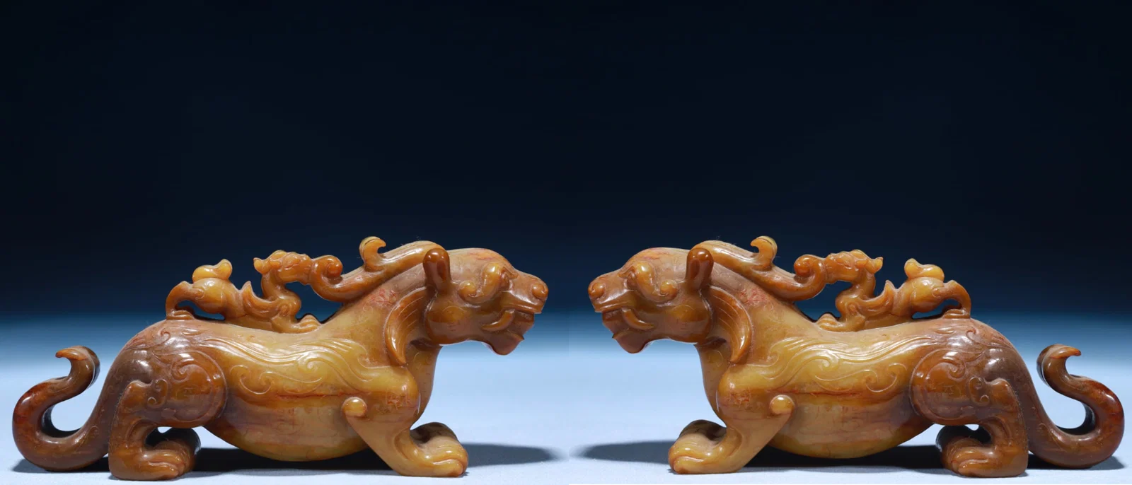 A Pair of Exquisite Archaic Jade Tiger Ornaments