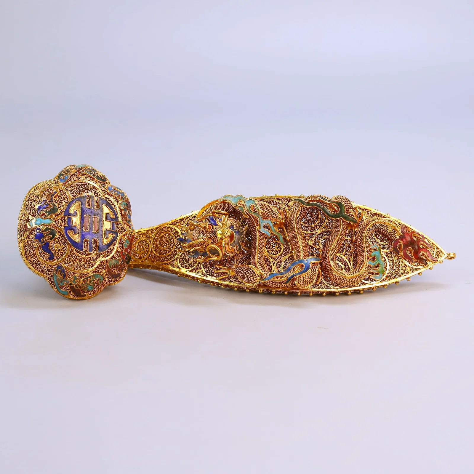 A pair of exquisite silk burnt blue dragon and phoenix pattern longevity character ruyi hairpins