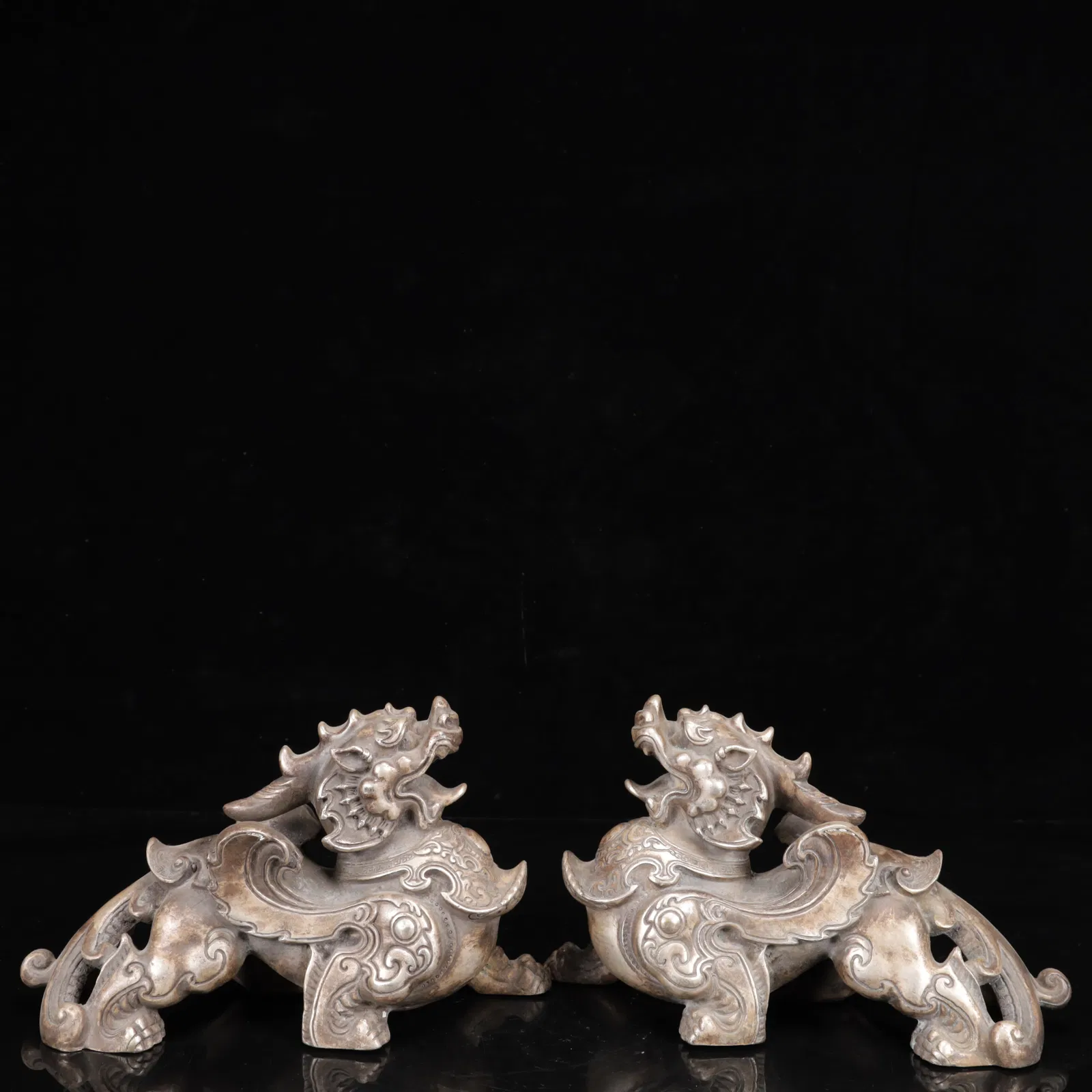 A Pair of Exquisite Silver Lion Ornaments