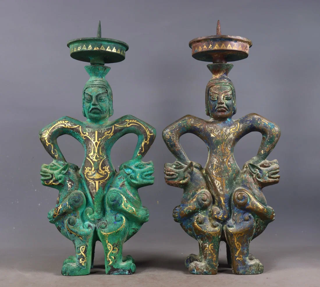 A Pair of ExquisiteGold and Silver-Inlaid Bronze Human-Shaped Candlesticks