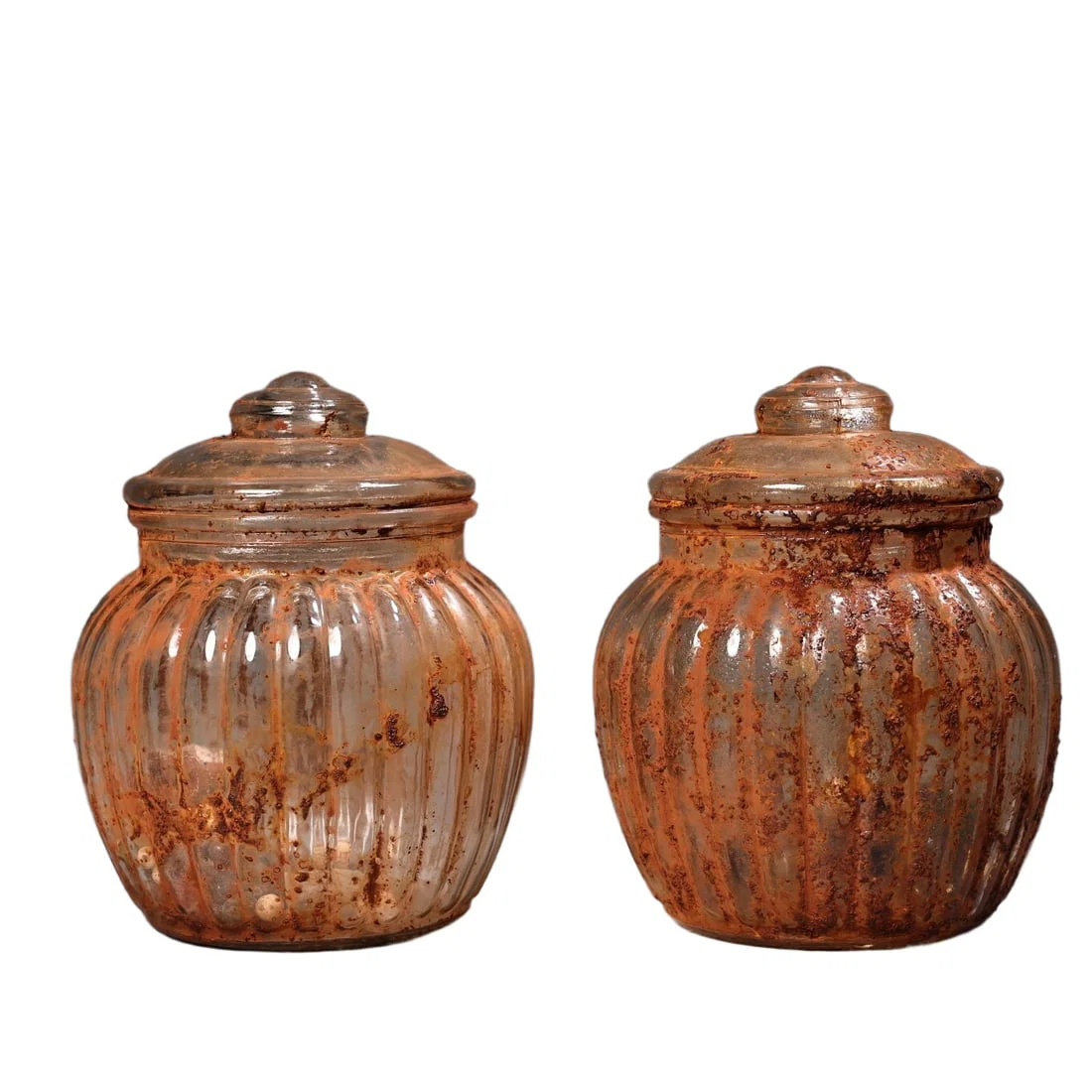 A pair of glass relic jars.