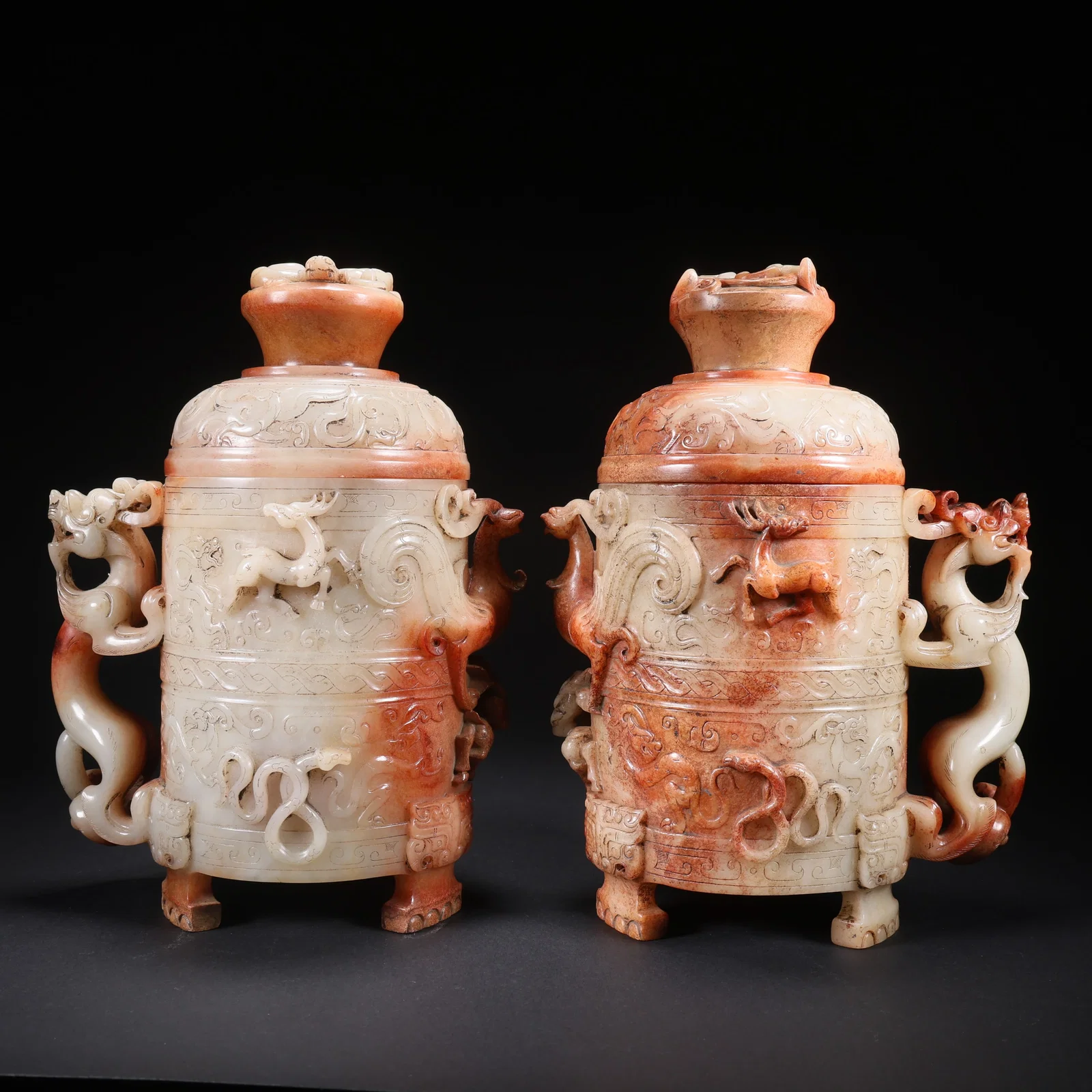 A PAIR OF HETIAN JADE COVERED CUPS WITH DRAGON, PHOENIX, AND DEER MOTIFS