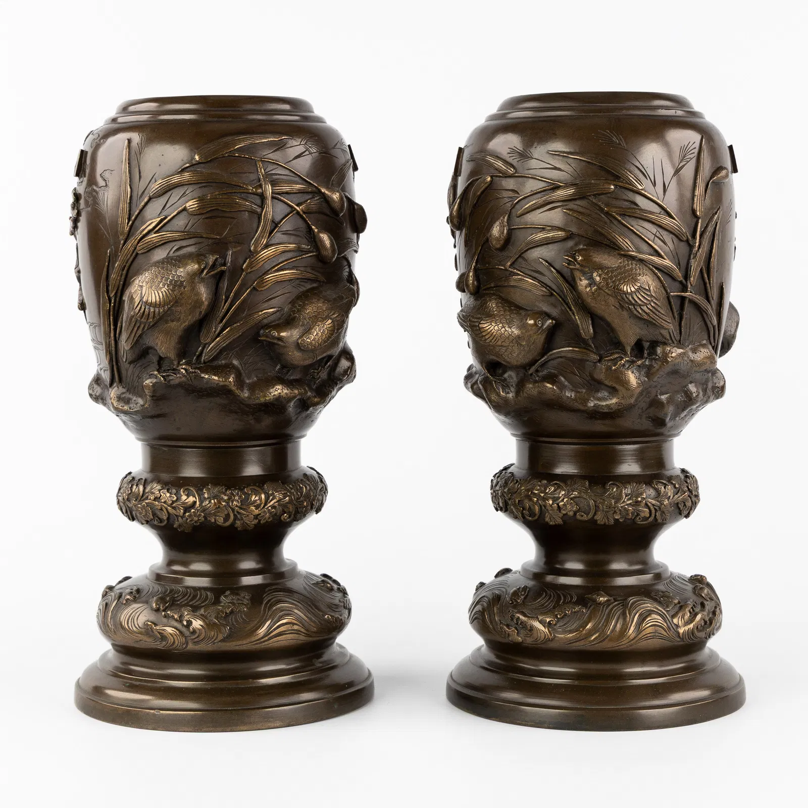 A Pair of Japanese bronze vases, decorated with sculptured Birds, Meiji, circa 1900.