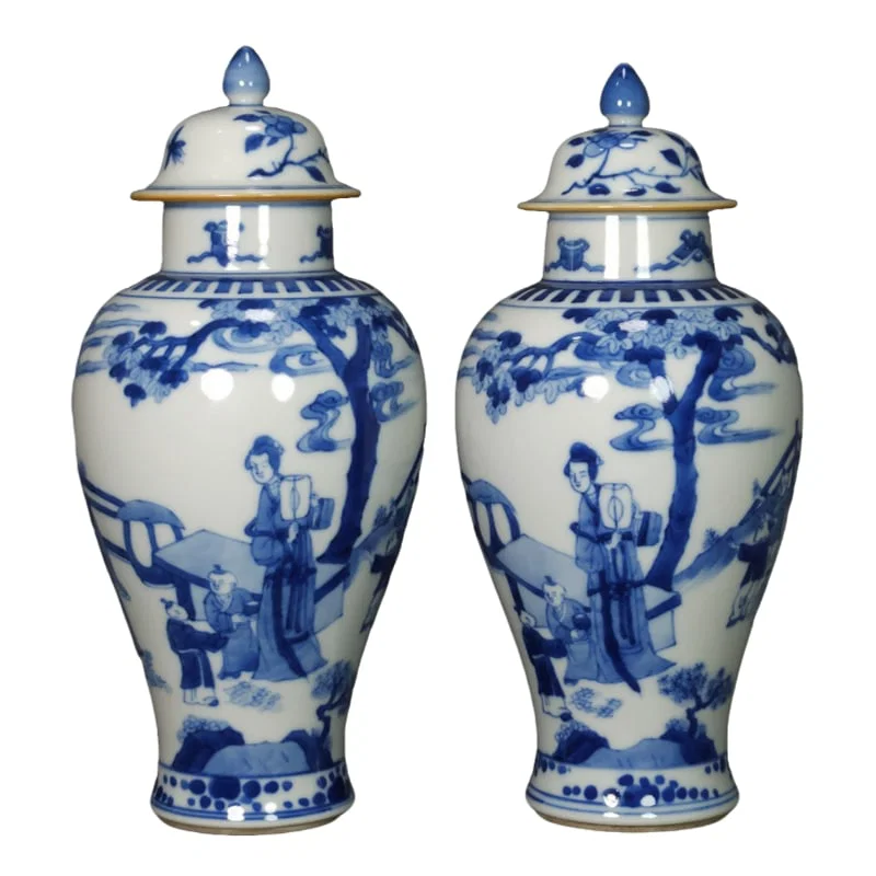 A pair of Kangxi blue and white porcelain jars depicting the Three Maidens Teaching the General's