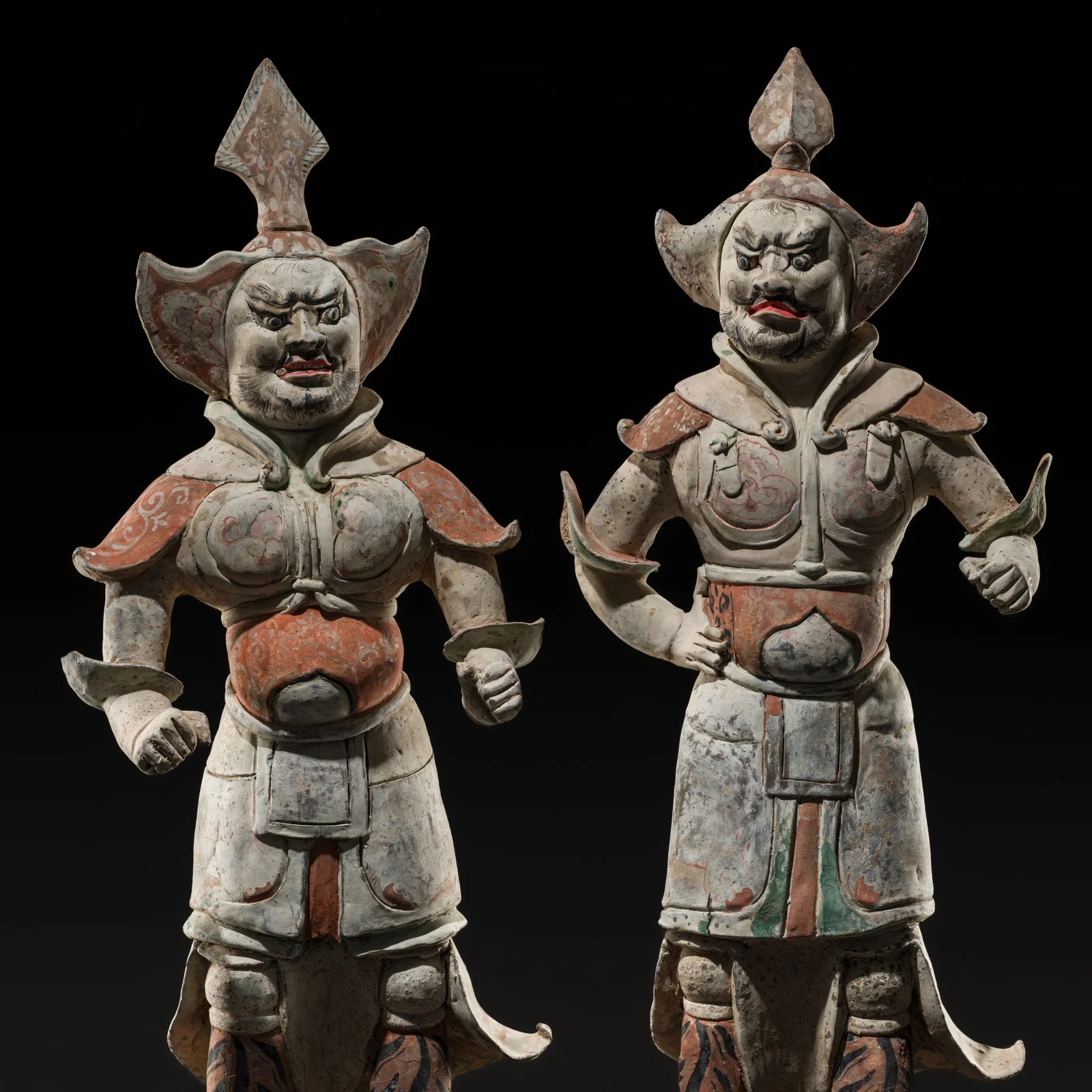 A PAIR OF LARGE AND FINELY PAINTED GUARDIAN FIGURES, WUSHIYONG, TANG DYNASTY, PUBLISHED AND