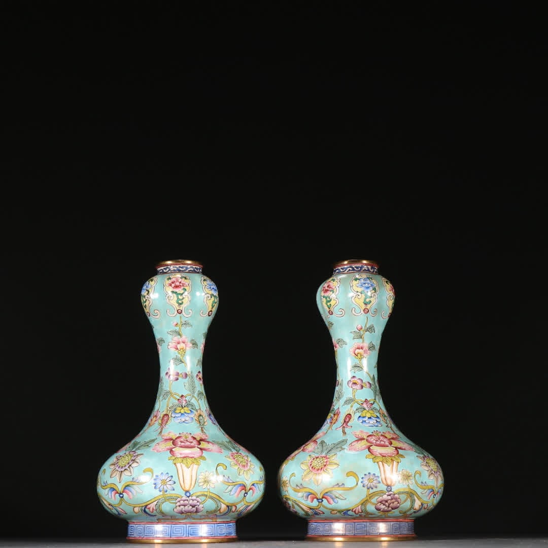 A pair of Qing Dynasty copper tire painting enamel flower pattern garlic bottles