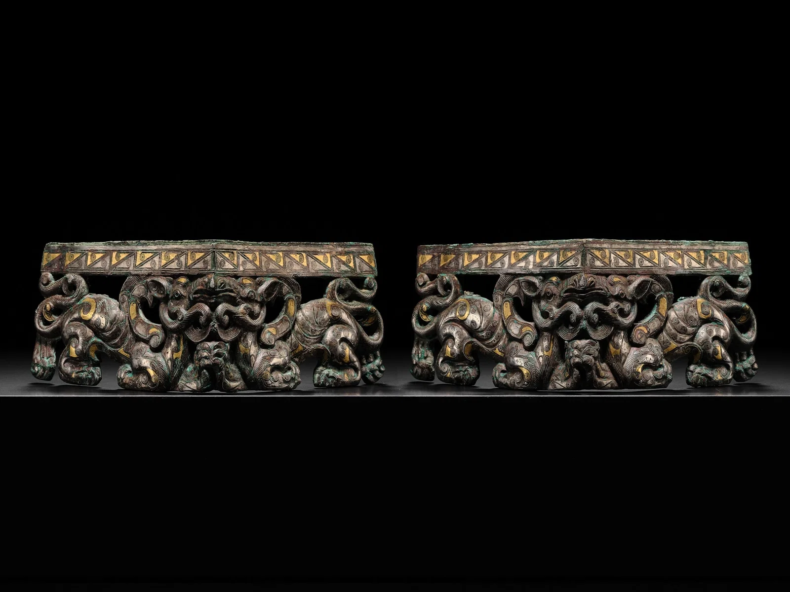 A PAIR OF RARE GOLD AND SILVER-INLAID BRONZE CORNER FITTINGS, EASTERN ZHOU DYNASTY, WARRING STATES
